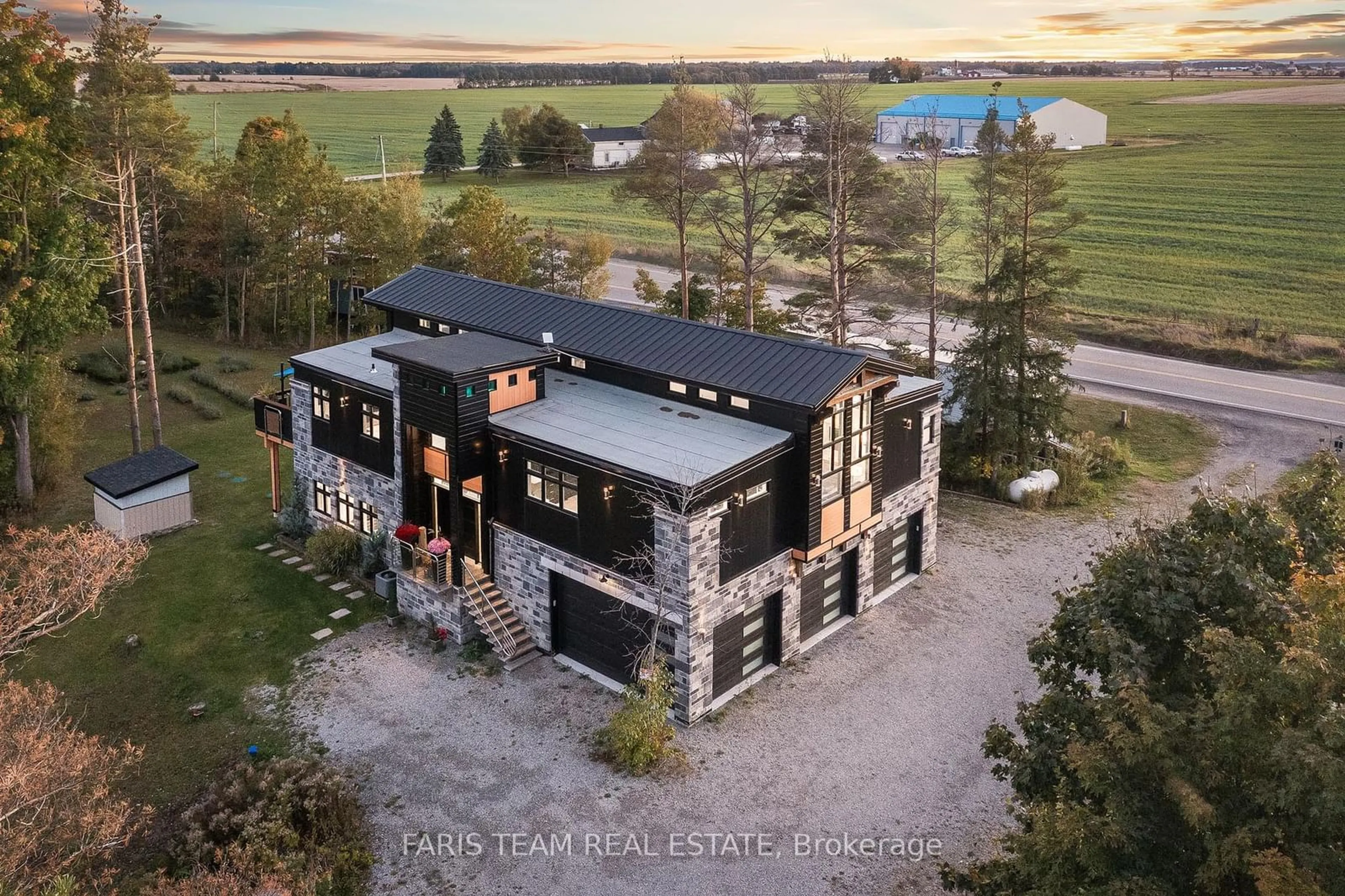 A pic from outside/outdoor area/front of a property/back of a property/a pic from drone, building for 15512 County Road 27, Springwater Ontario L0L 1P0