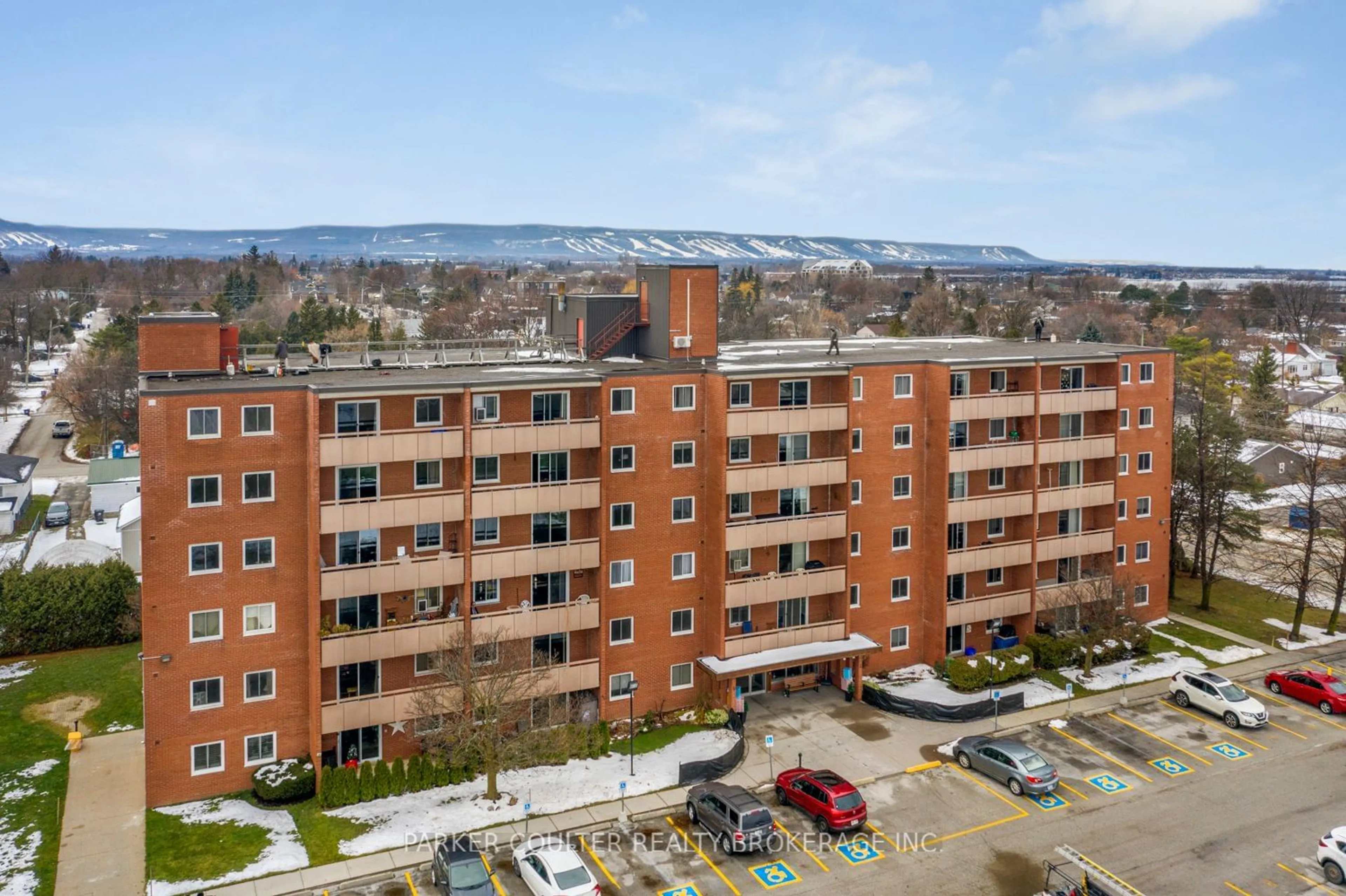 A pic from outside/outdoor area/front of a property/back of a property/a pic from drone, city buildings view from balcony for 460 Ontario St #407, Collingwood Ontario L9Y 4E5