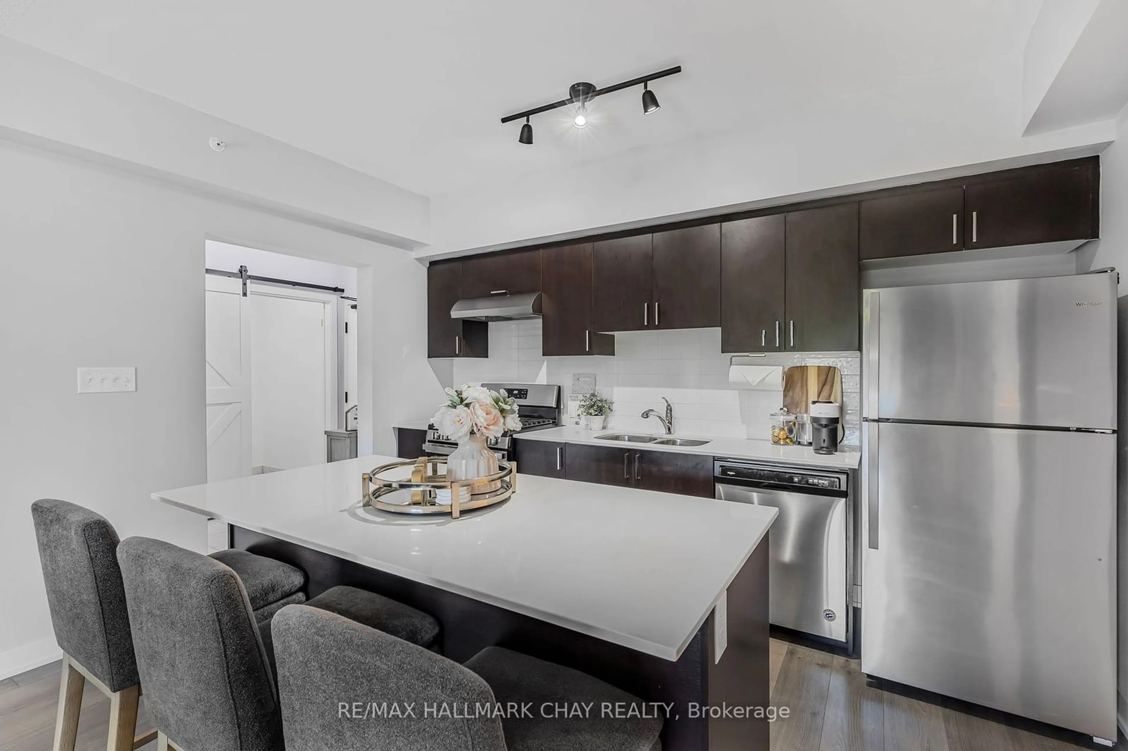 Open concept kitchen, unknown for 5 Chef Lane #208, Barrie Ontario L9J 0J8