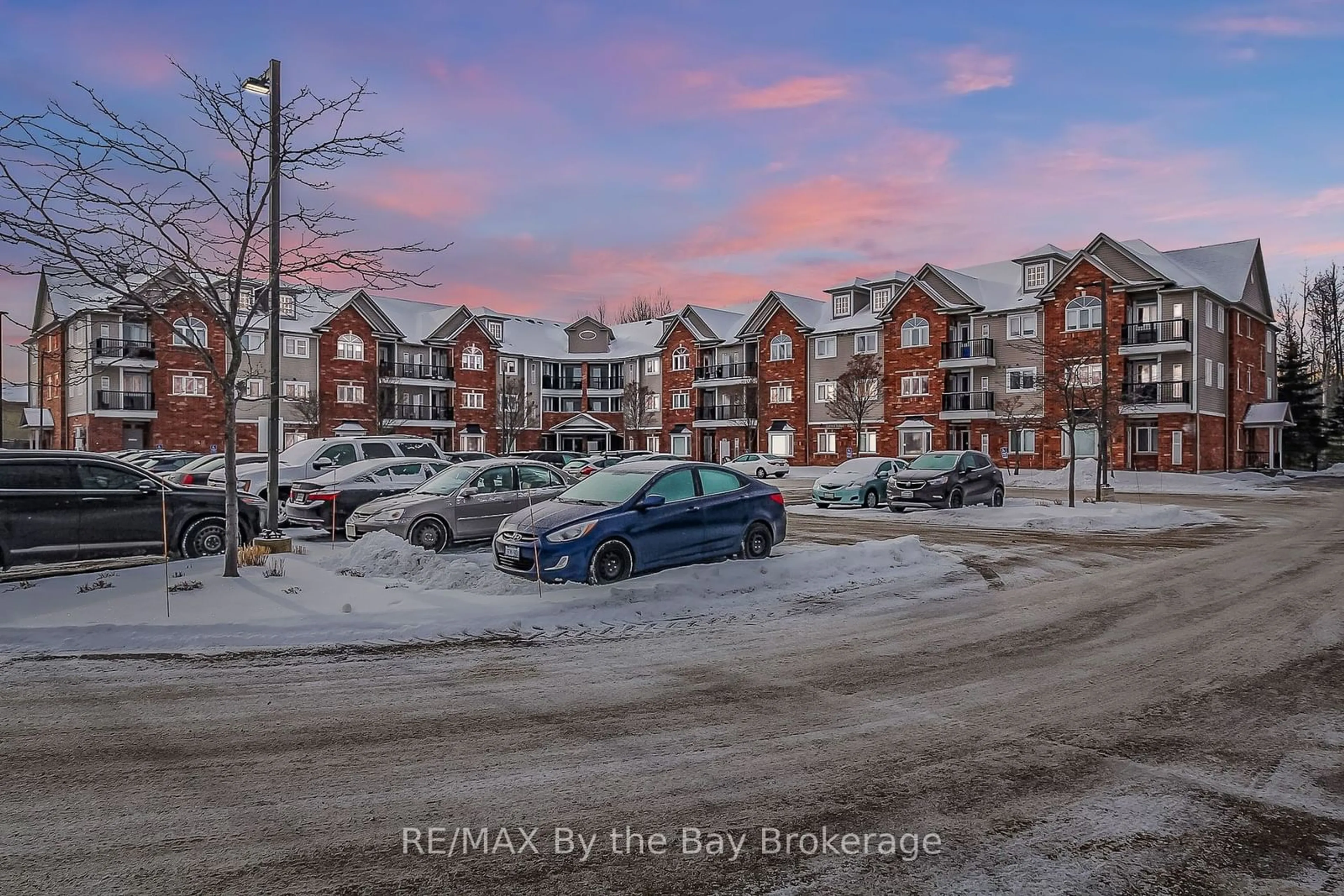 A pic from outside/outdoor area/front of a property/back of a property/a pic from drone, street for 16 Westbury Rd #211, Wasaga Beach Ontario L9Z 0B8