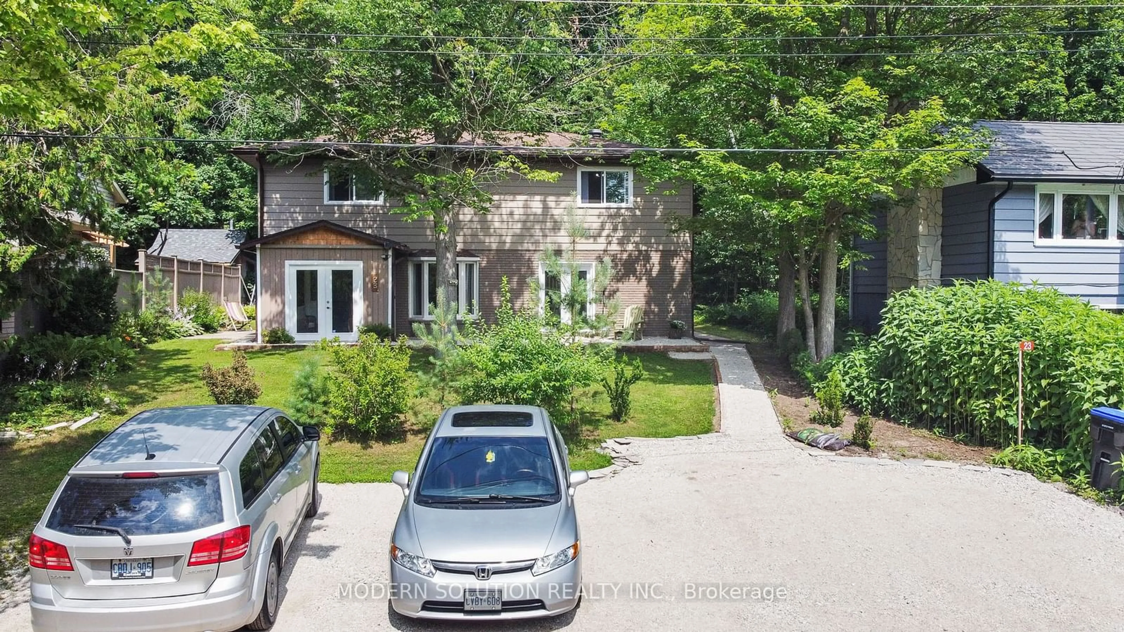 A pic from outside/outdoor area/front of a property/back of a property/a pic from drone, street for 23 Elizabeth Ave, Tiny Ontario L0L 1P1