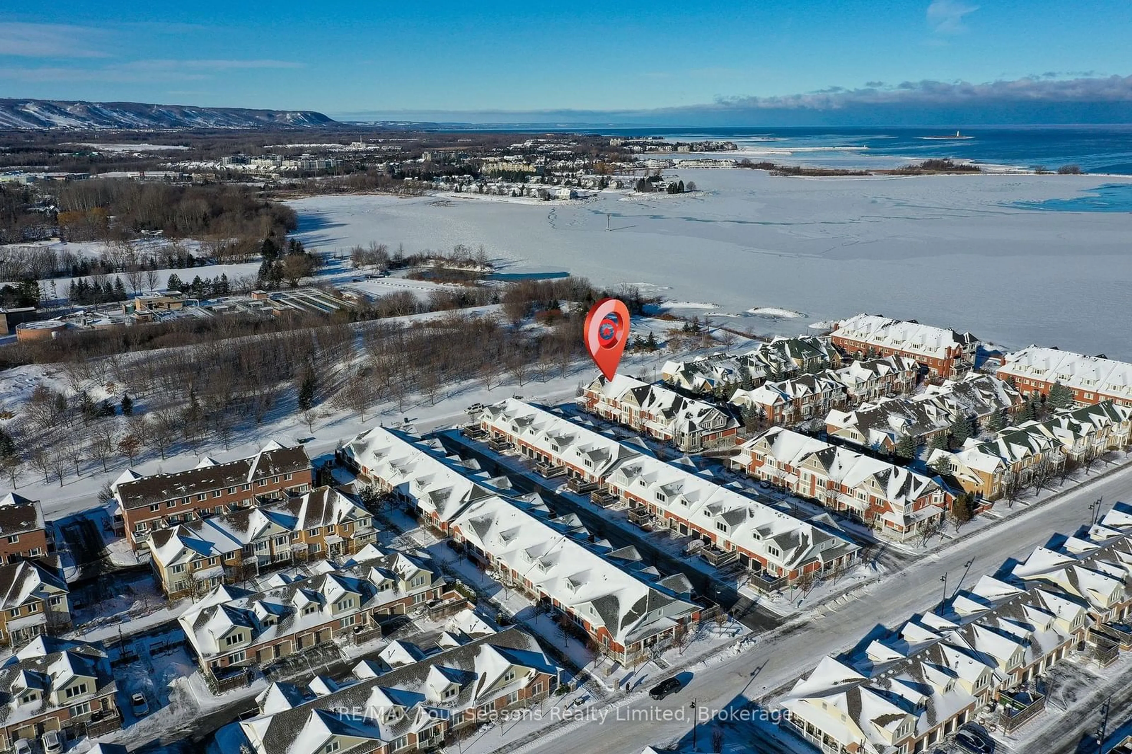 A pic from outside/outdoor area/front of a property/back of a property/a pic from drone, water/lake/river/ocean view for 19 Collship Lane, Collingwood Ontario L9Y 0J6