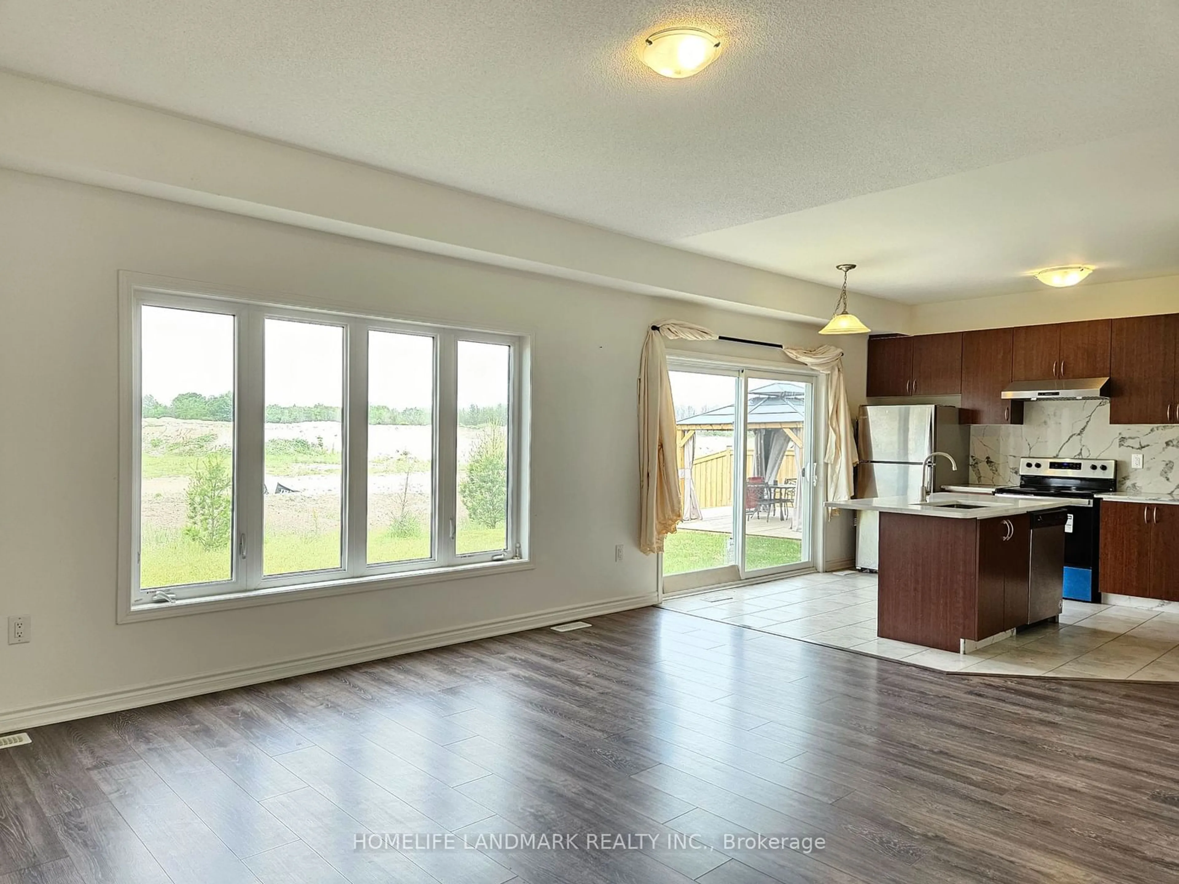 Open concept kitchen, unknown for 20 Sandhill Crane Dr, Wasaga Beach Ontario L9Z 0J6