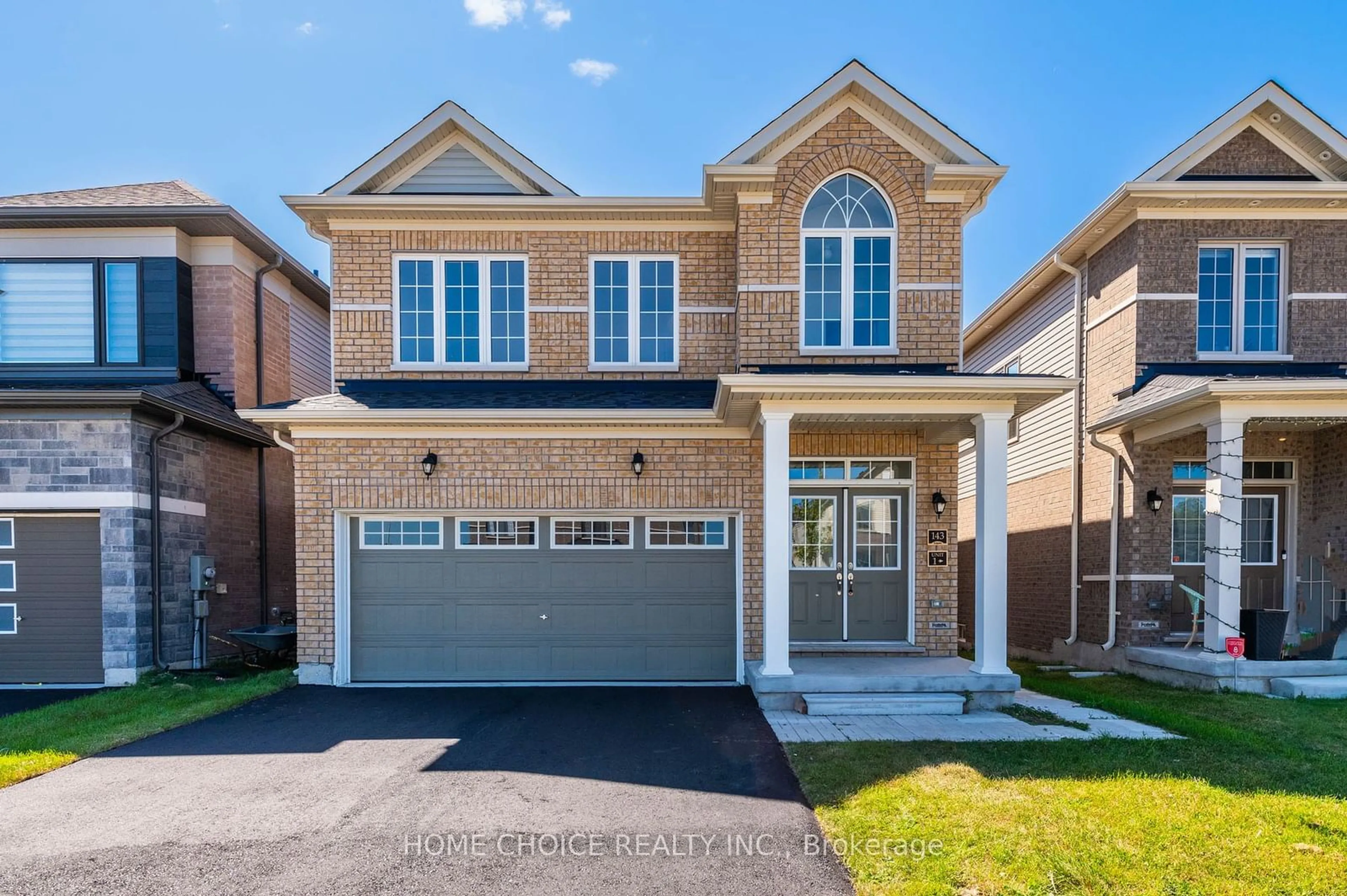 Home with brick exterior material, street for 143 Terry Fox Dr, Barrie Ontario L9L 0L9