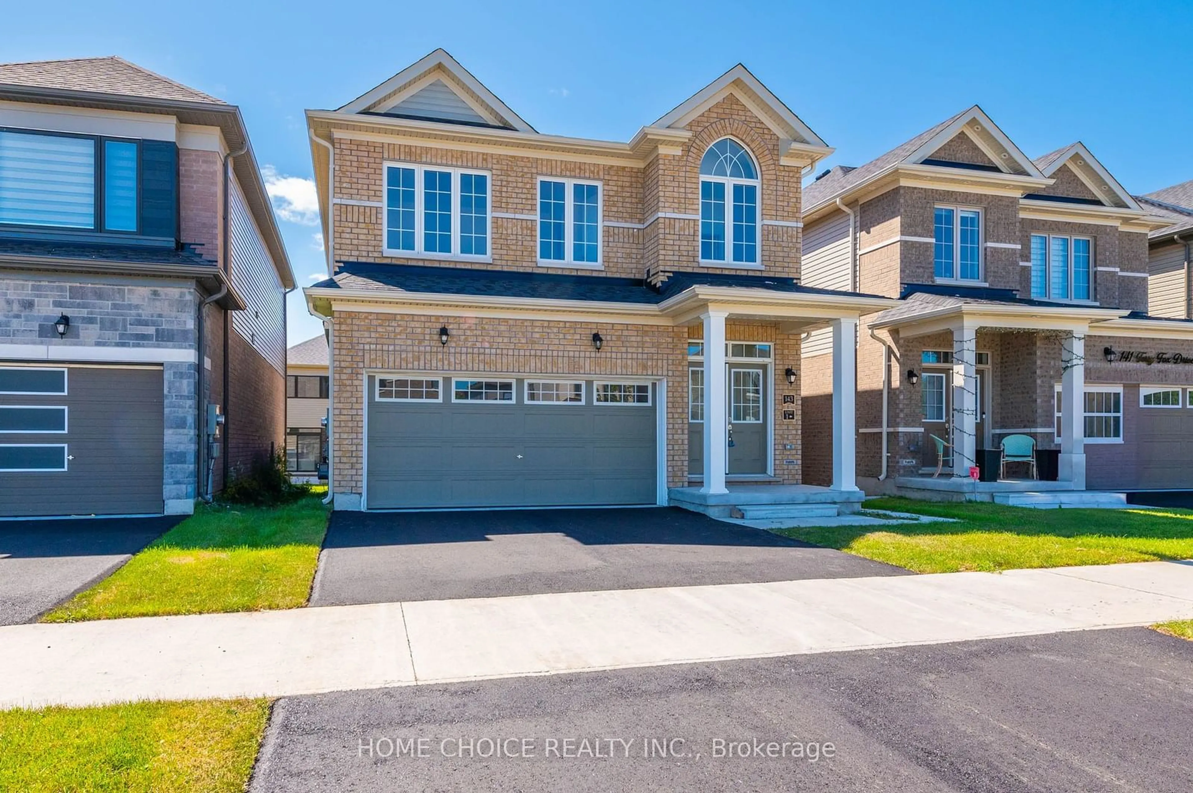 Home with brick exterior material, street for 143 Terry Fox Dr, Barrie Ontario L9L 0L9