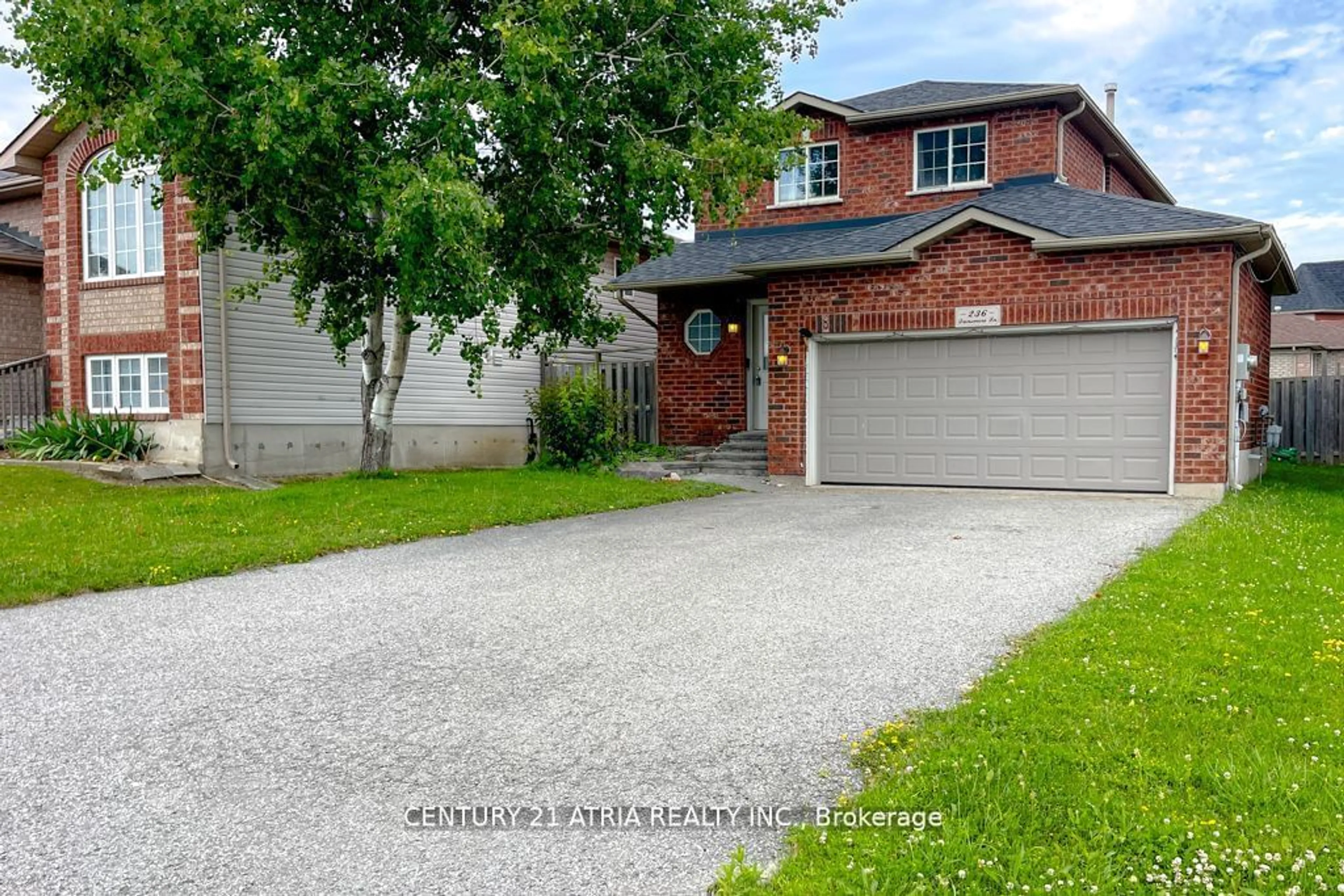 Home with brick exterior material, street for 236 Dunsmore Lane, Barrie Ontario L4M 7A4