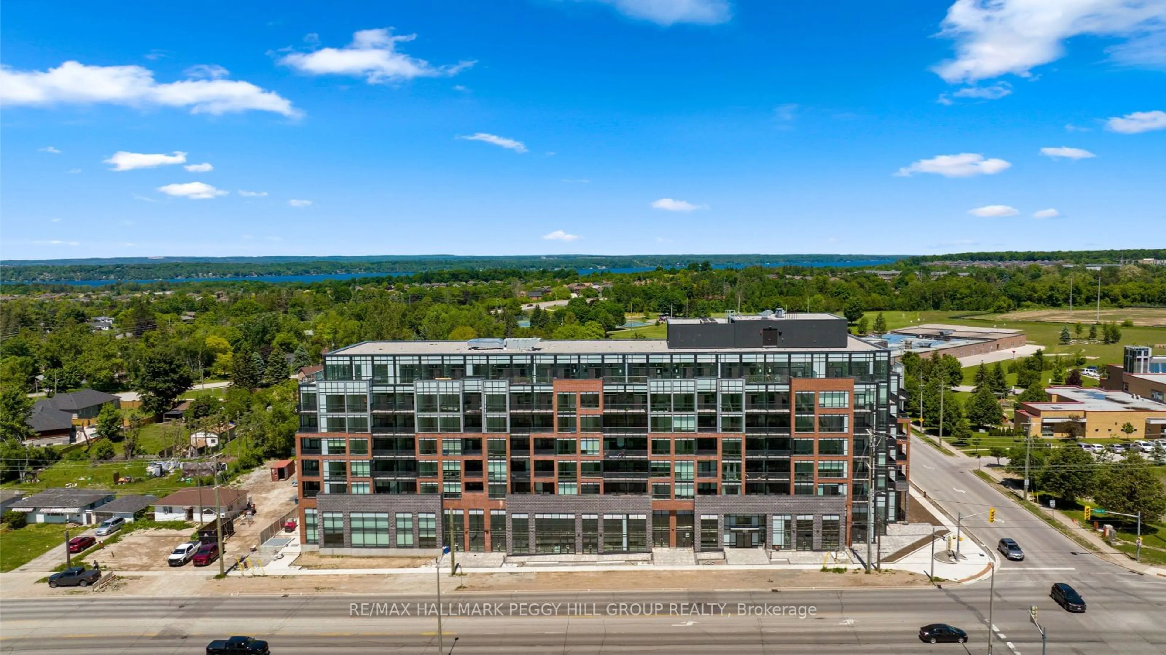 A pic from outside/outdoor area/front of a property/back of a property/a pic from drone, city buildings view from balcony for 681 Yonge St #502, Barrie Ontario L4N 4E8