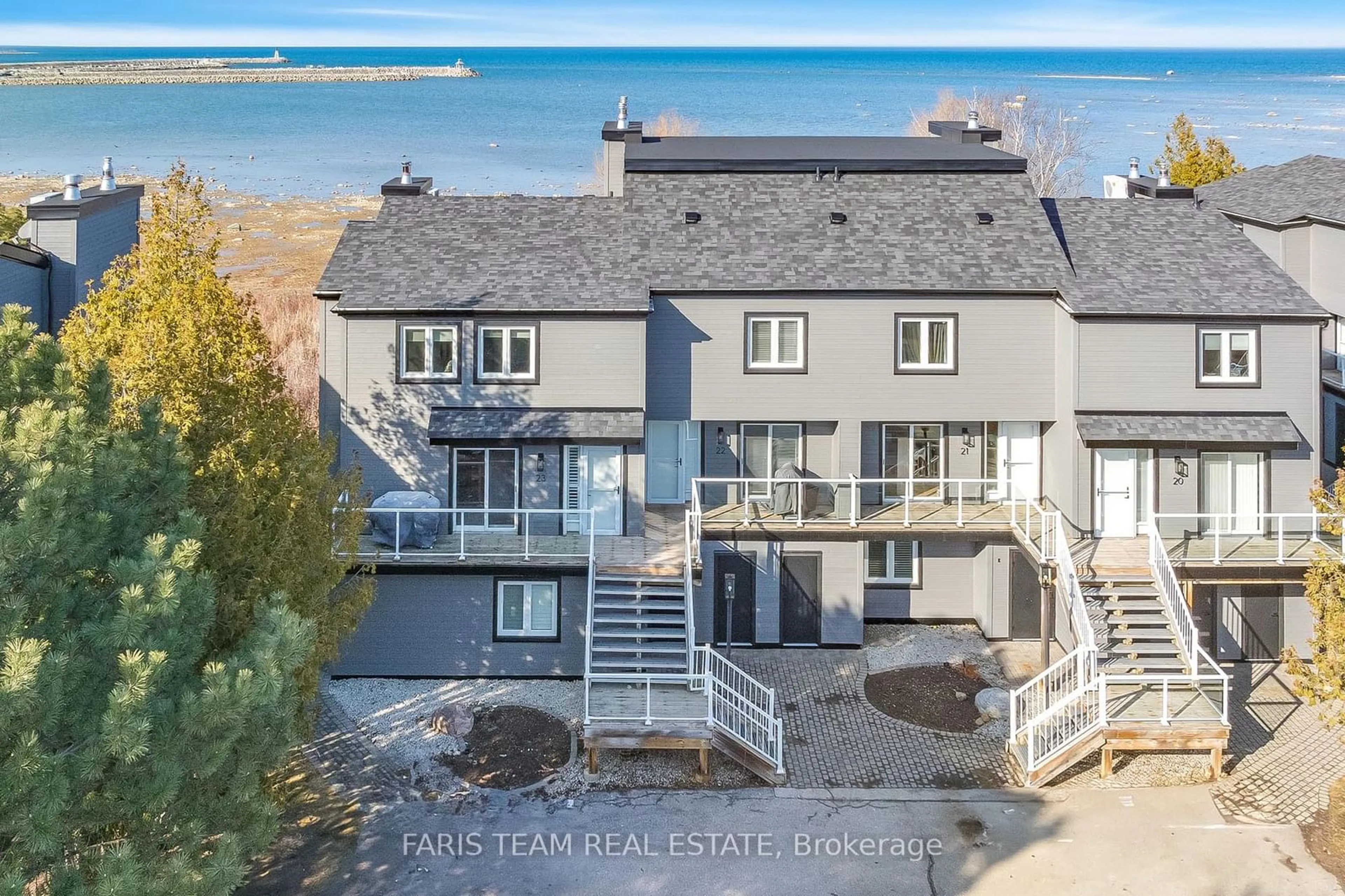 A pic from outside/outdoor area/front of a property/back of a property/a pic from drone, water/lake/river/ocean view for 44 Trott Blvd #23, Collingwood Ontario L9Y 5B7