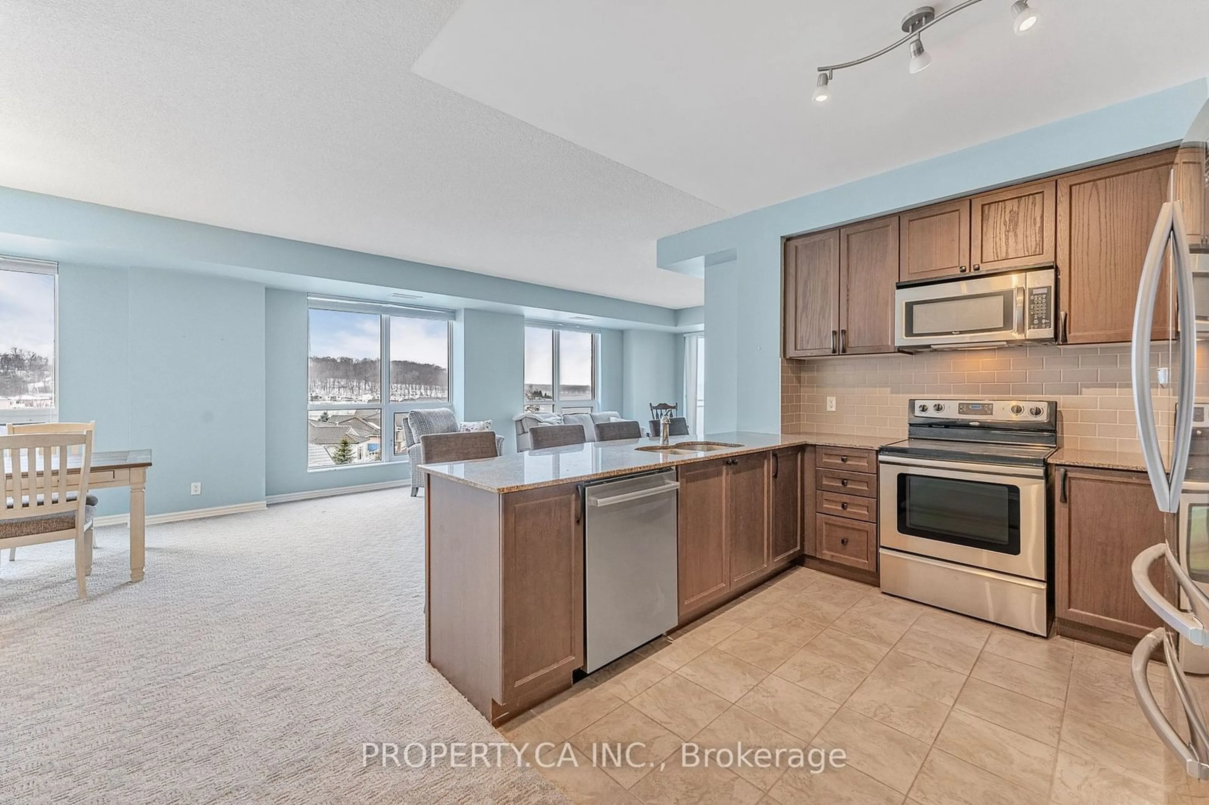 Open concept kitchen, ceramic/tile floor for 699 Aberdeen Blvd #401, Midland Ontario L4R 5P2