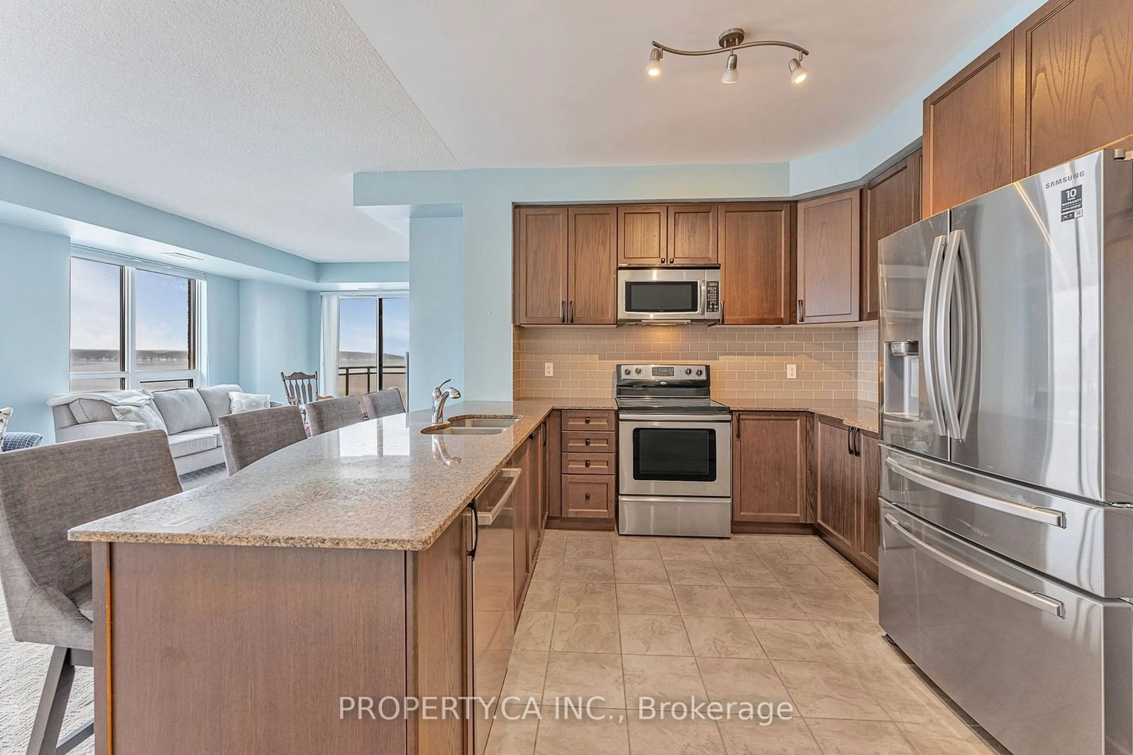 Open concept kitchen, ceramic/tile floor for 699 Aberdeen Blvd #401, Midland Ontario L4R 5P2