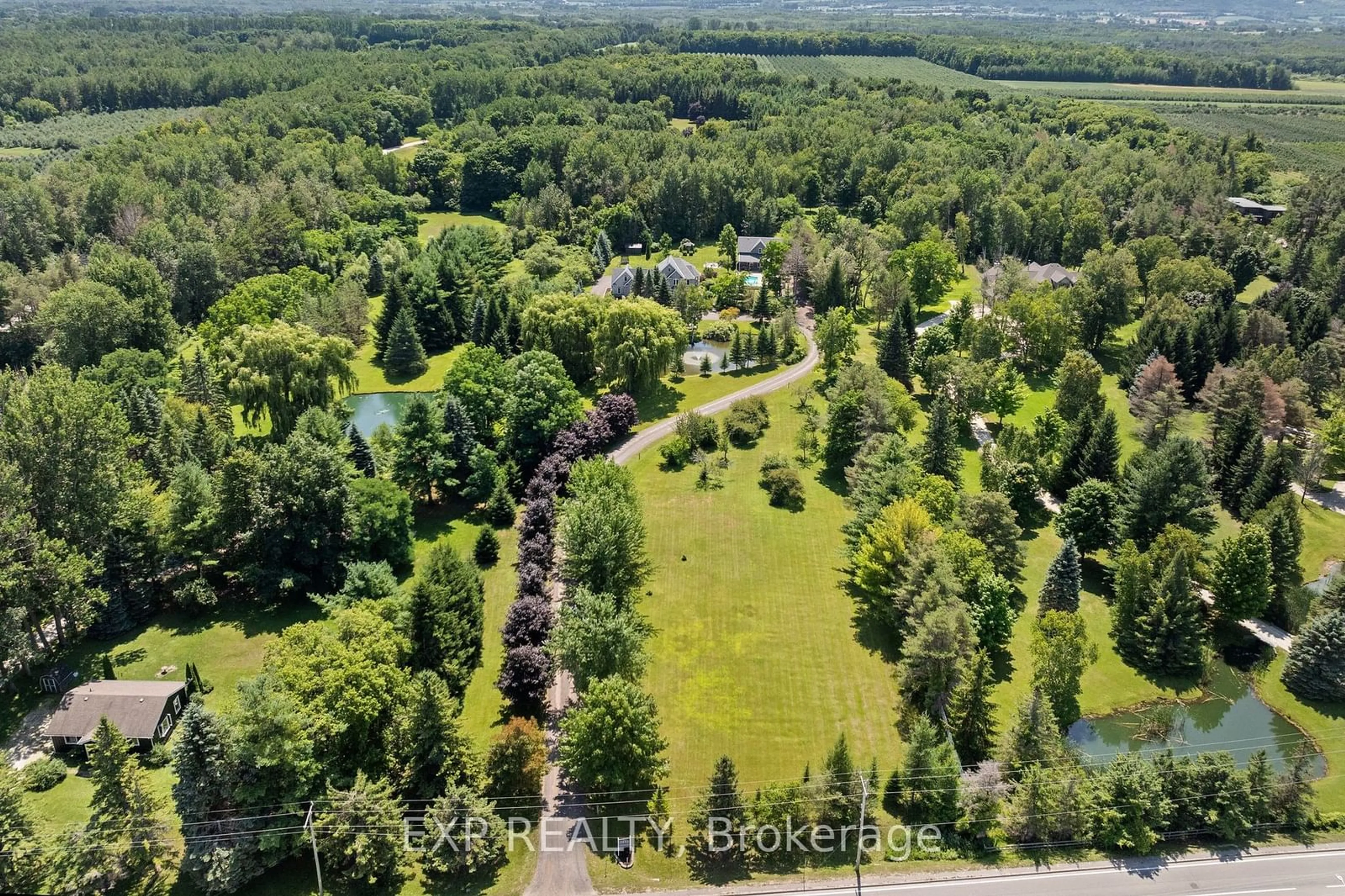 A pic from outside/outdoor area/front of a property/back of a property/a pic from drone, forest/trees view for 7833 Poplar Sdrd, Clearview Ontario L9Y 5N4