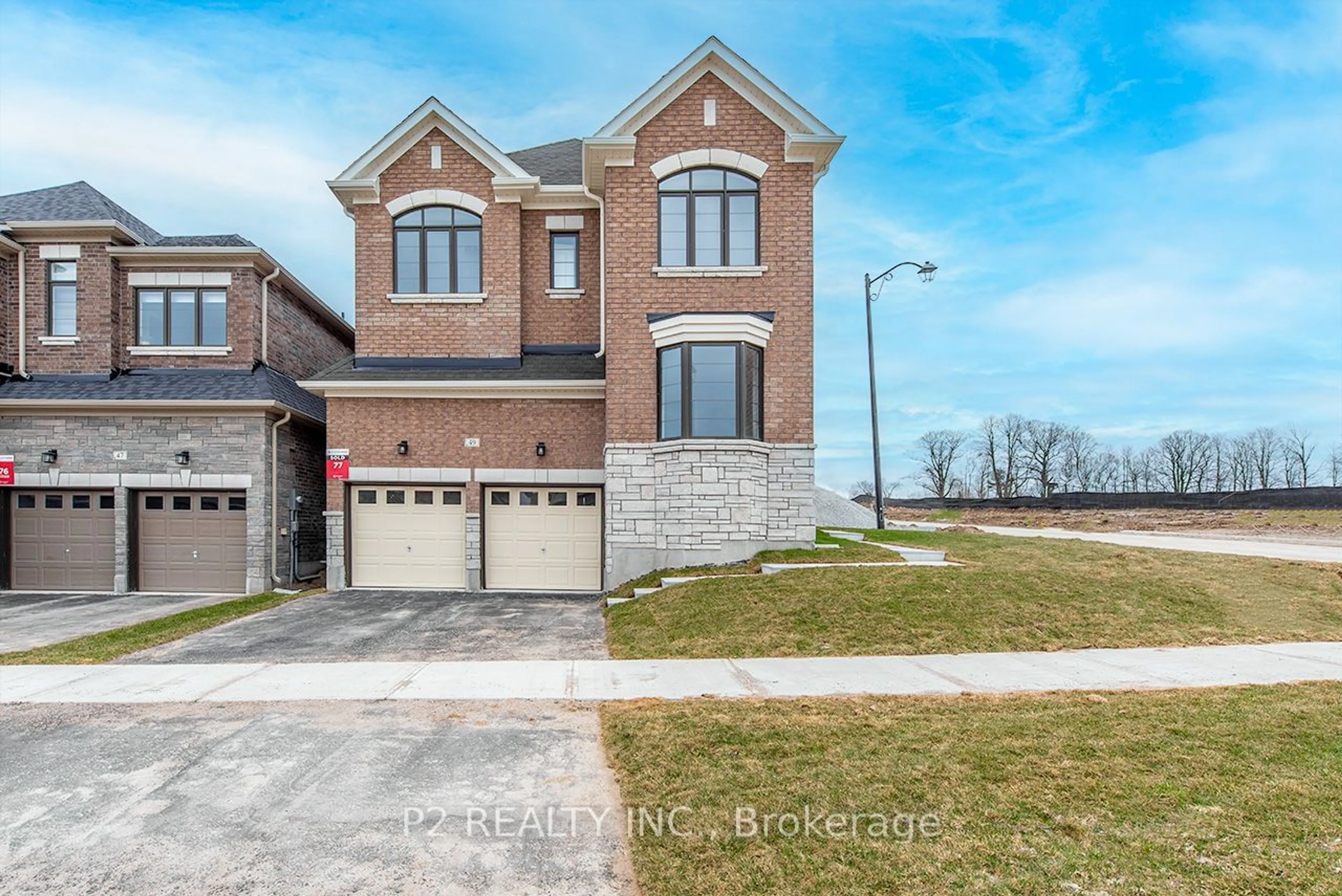 Home with brick exterior material, street for 49 Periwinkle Rd, Springwater Ontario L9X 2C9