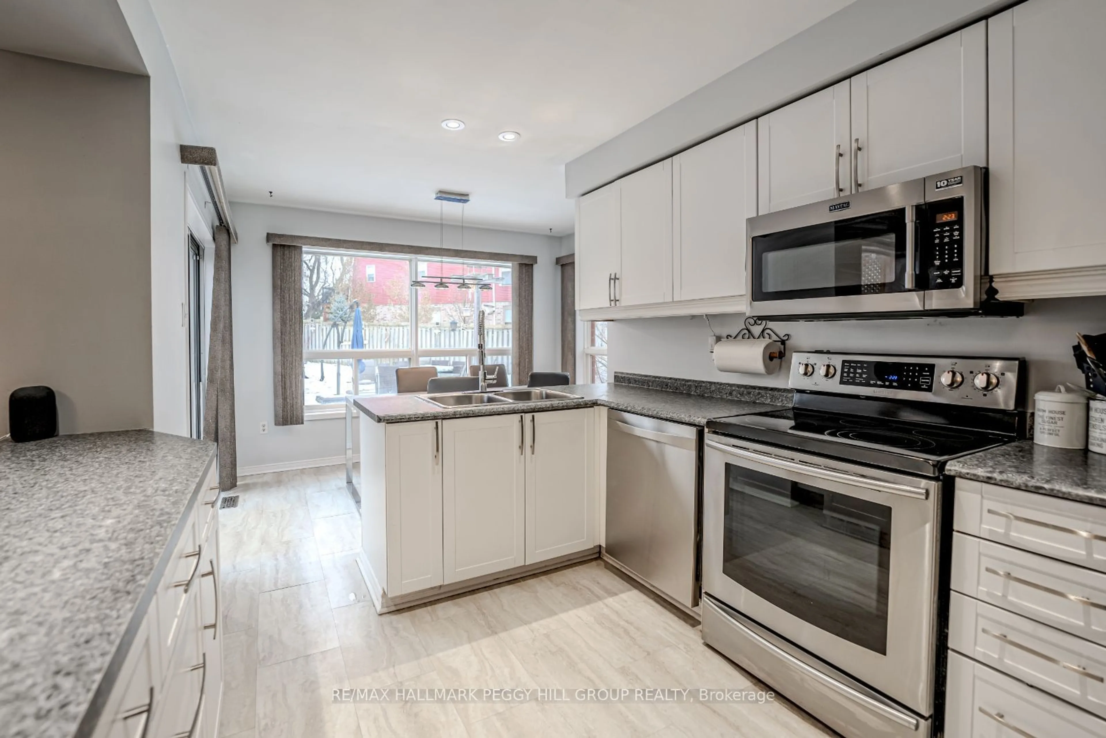 Open concept kitchen, ceramic/tile floor for 56 Draper Cres, Barrie Ontario L4N 6B1