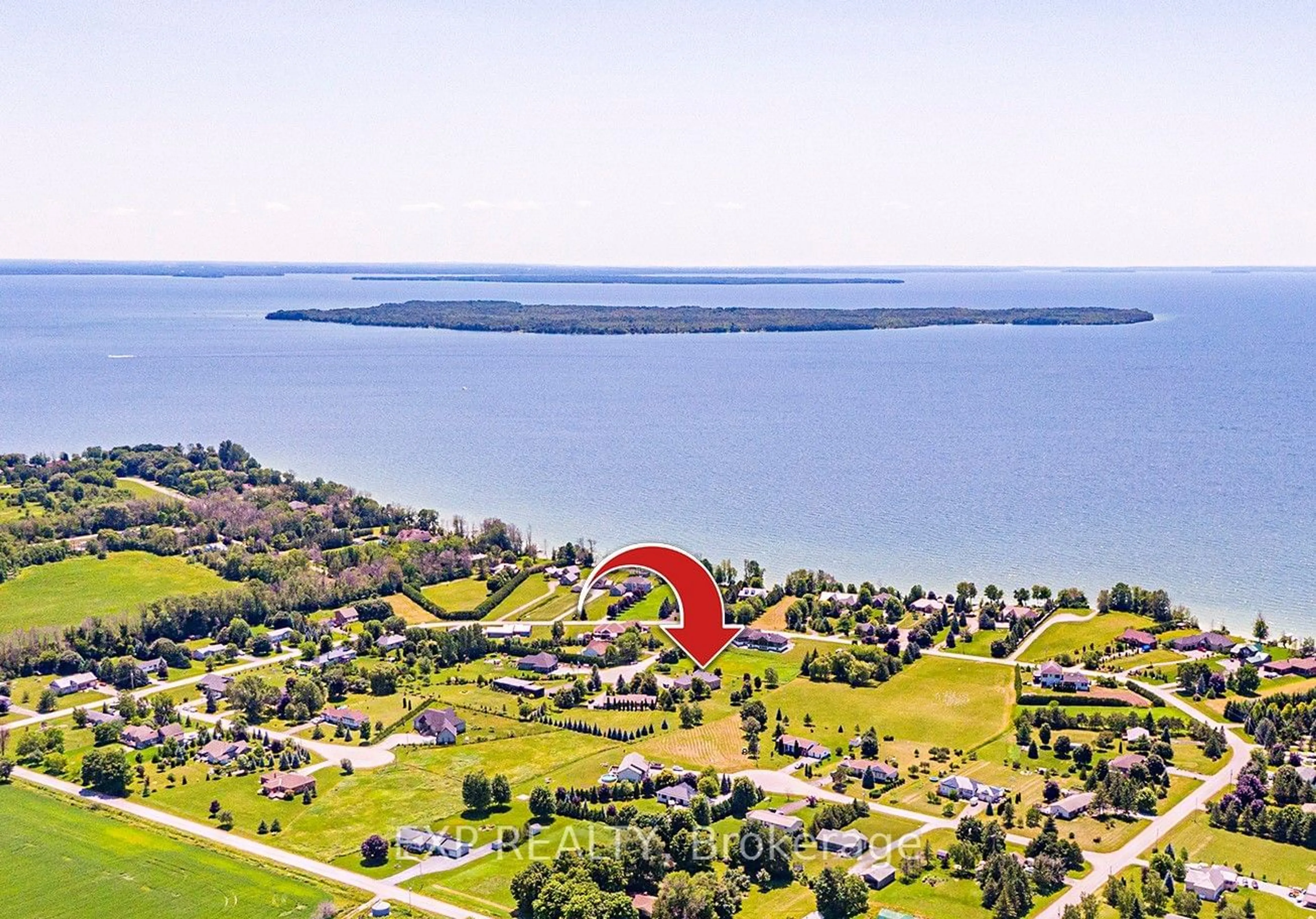 A pic from outside/outdoor area/front of a property/back of a property/a pic from drone, water/lake/river/ocean view for 2884 Sunnydale Lane, Ramara Ontario L0K 1B0