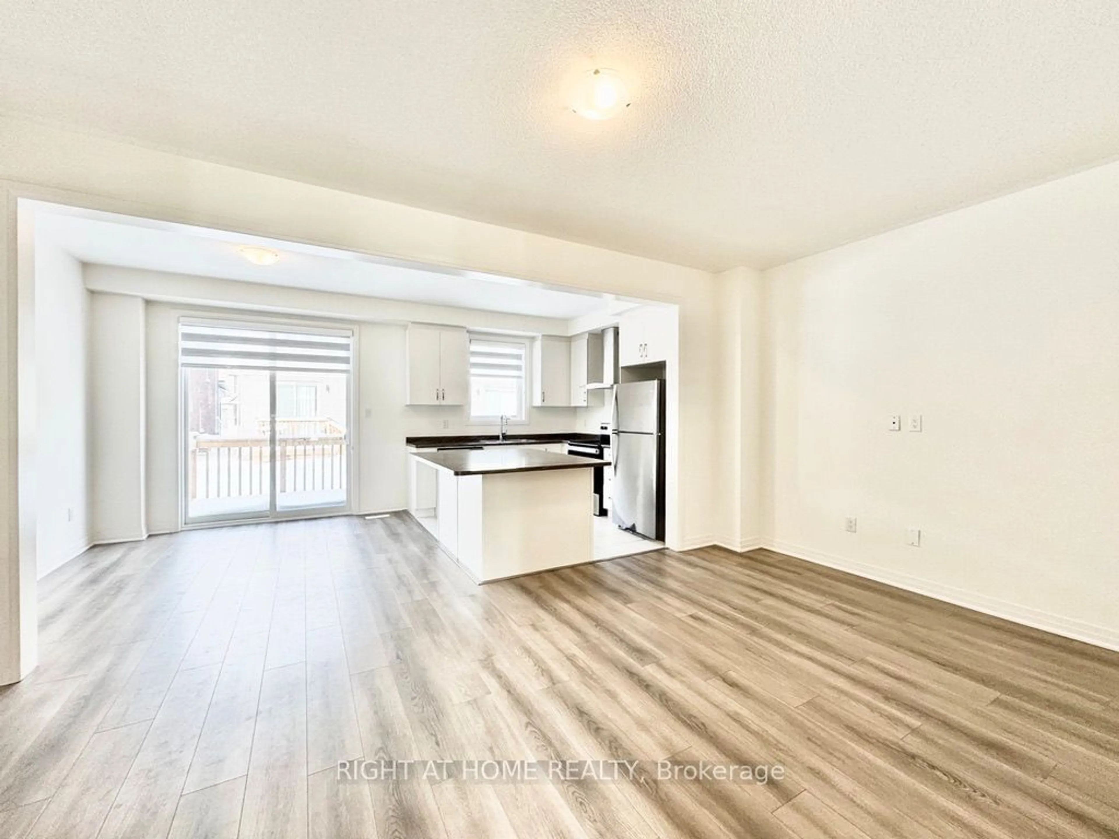 Open concept kitchen, wood/laminate floor for 89 Shepherd Dr, Barrie Ontario L9J 0K4