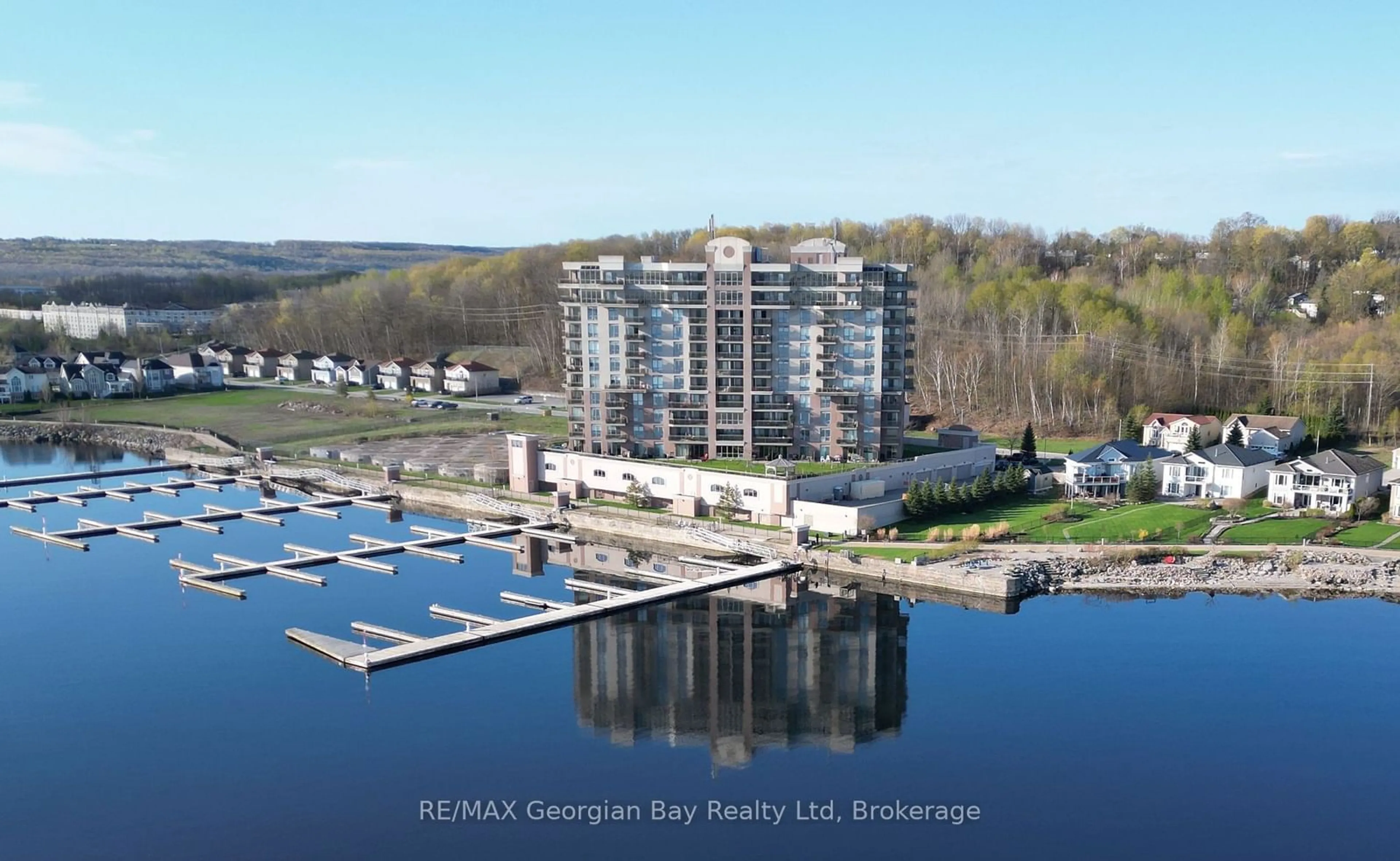 A pic from outside/outdoor area/front of a property/back of a property/a pic from drone, water/lake/river/ocean view for 699 ABERDEEN Blvd #403, Midland Ontario L4R 5P2