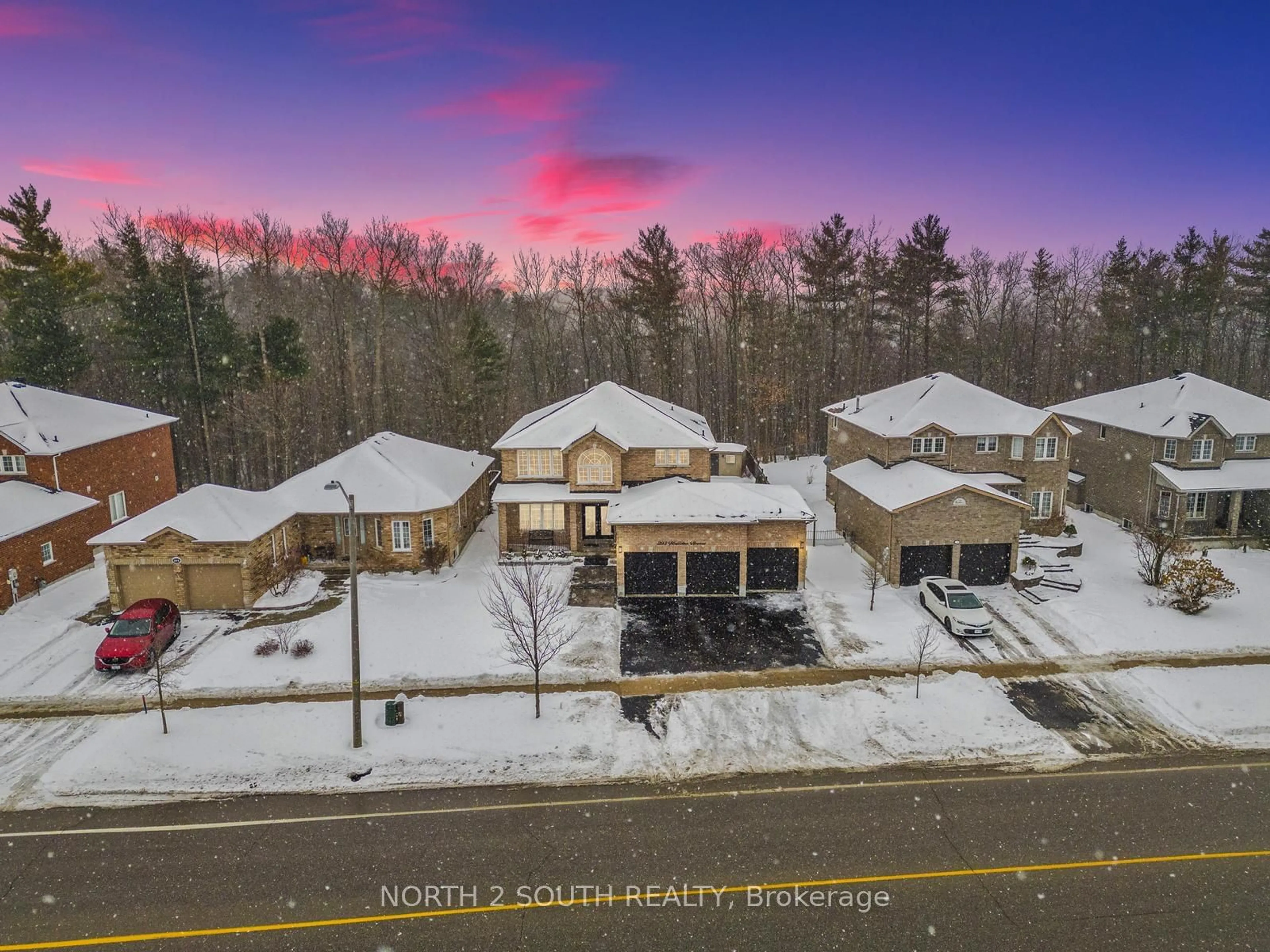 A pic from outside/outdoor area/front of a property/back of a property/a pic from drone, mountain view for 293 Mapleton Ave, Barrie Ontario L4N 5V4