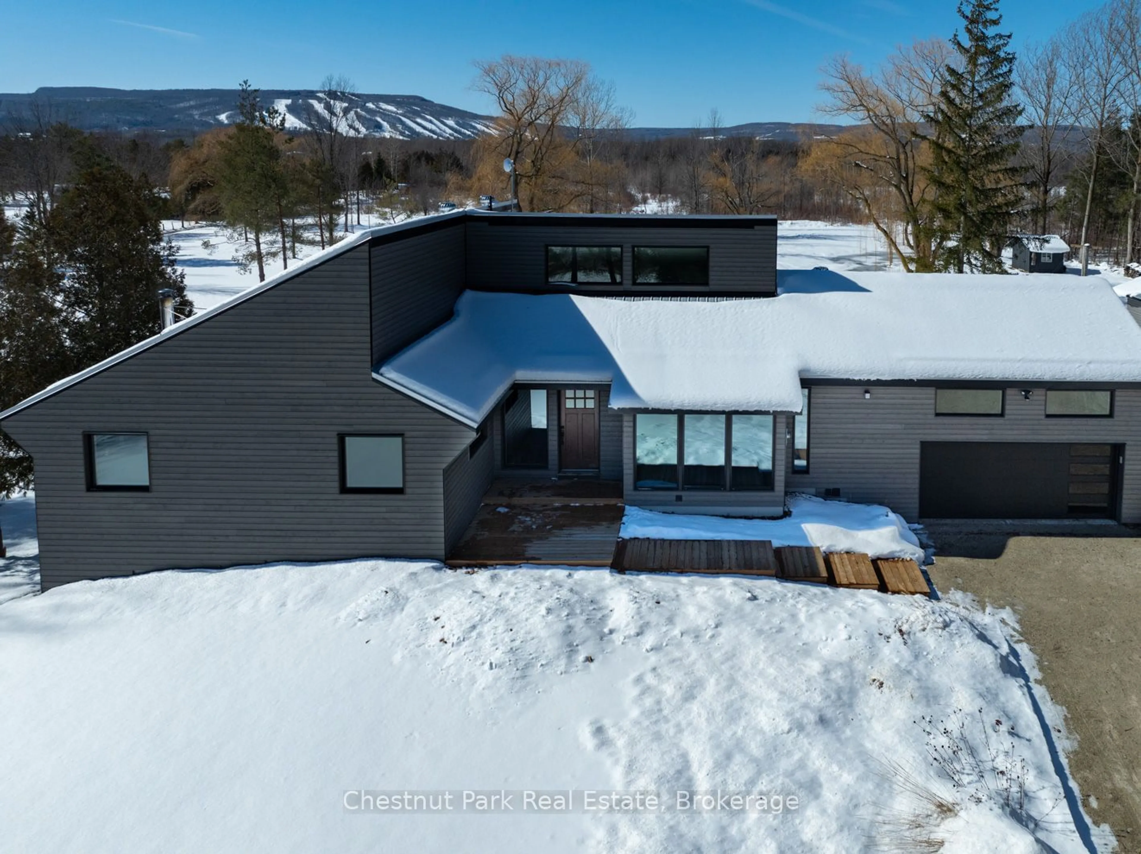 A pic from outside/outdoor area/front of a property/back of a property/a pic from drone, mountain view for 2890 Nottawasaga Conc 10, Clearview Ontario L9Y 3Y9