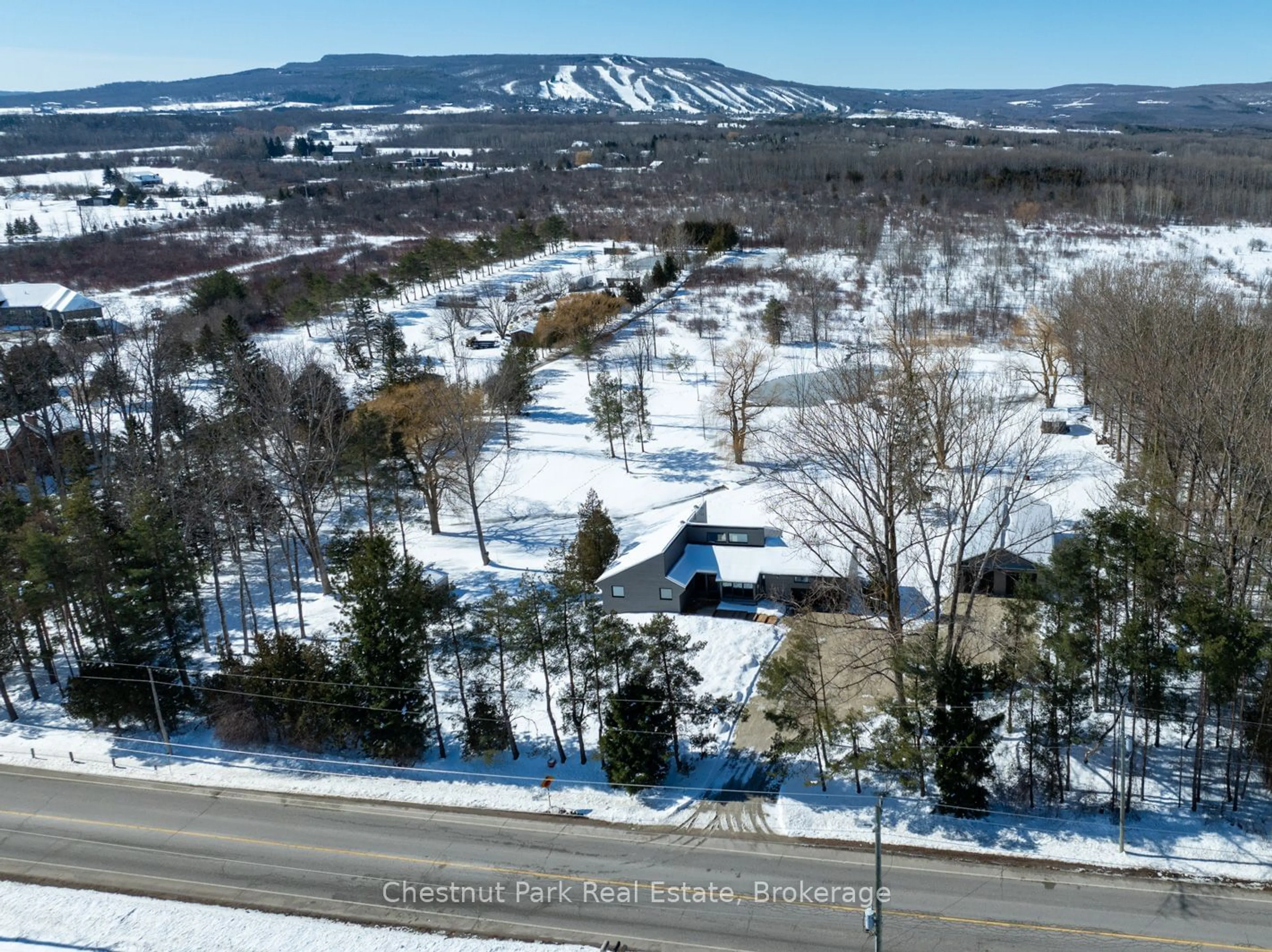 A pic from outside/outdoor area/front of a property/back of a property/a pic from drone, mountain view for 2890 Nottawasaga Conc 10, Clearview Ontario L9Y 3Y9