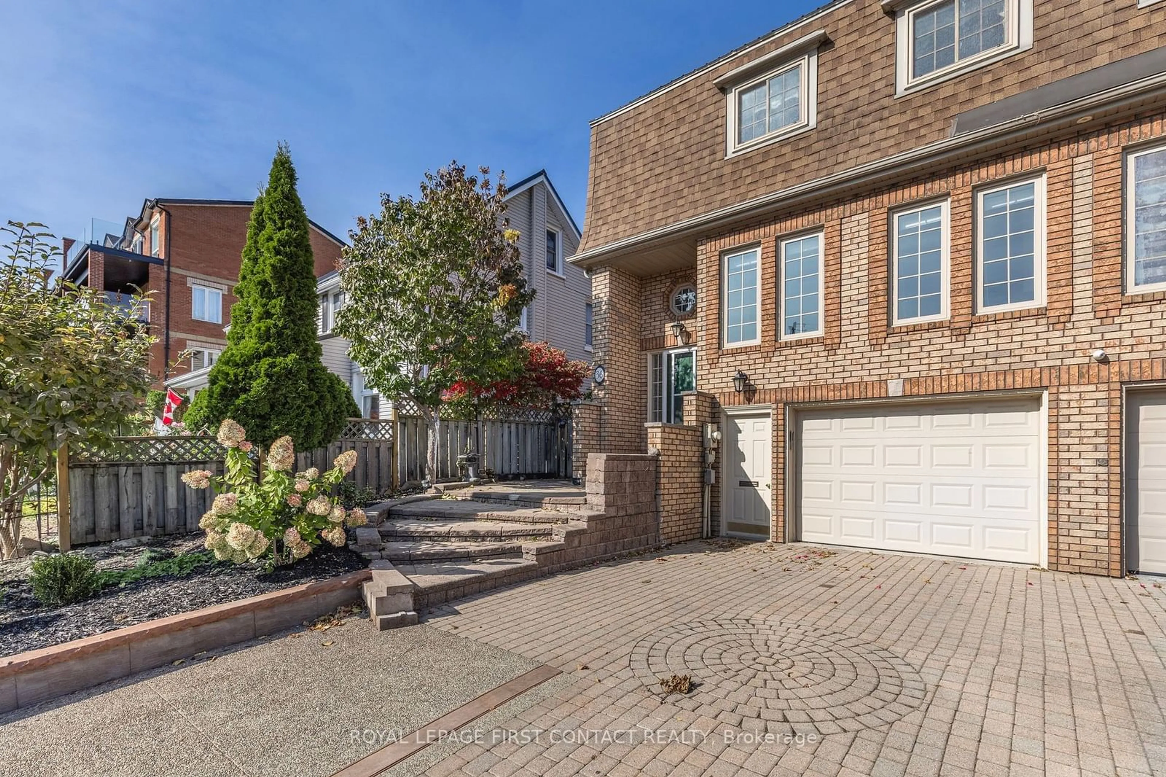 Home with brick exterior material, street for 36 Kempenfelt Dr, Barrie Ontario L4M 1B9