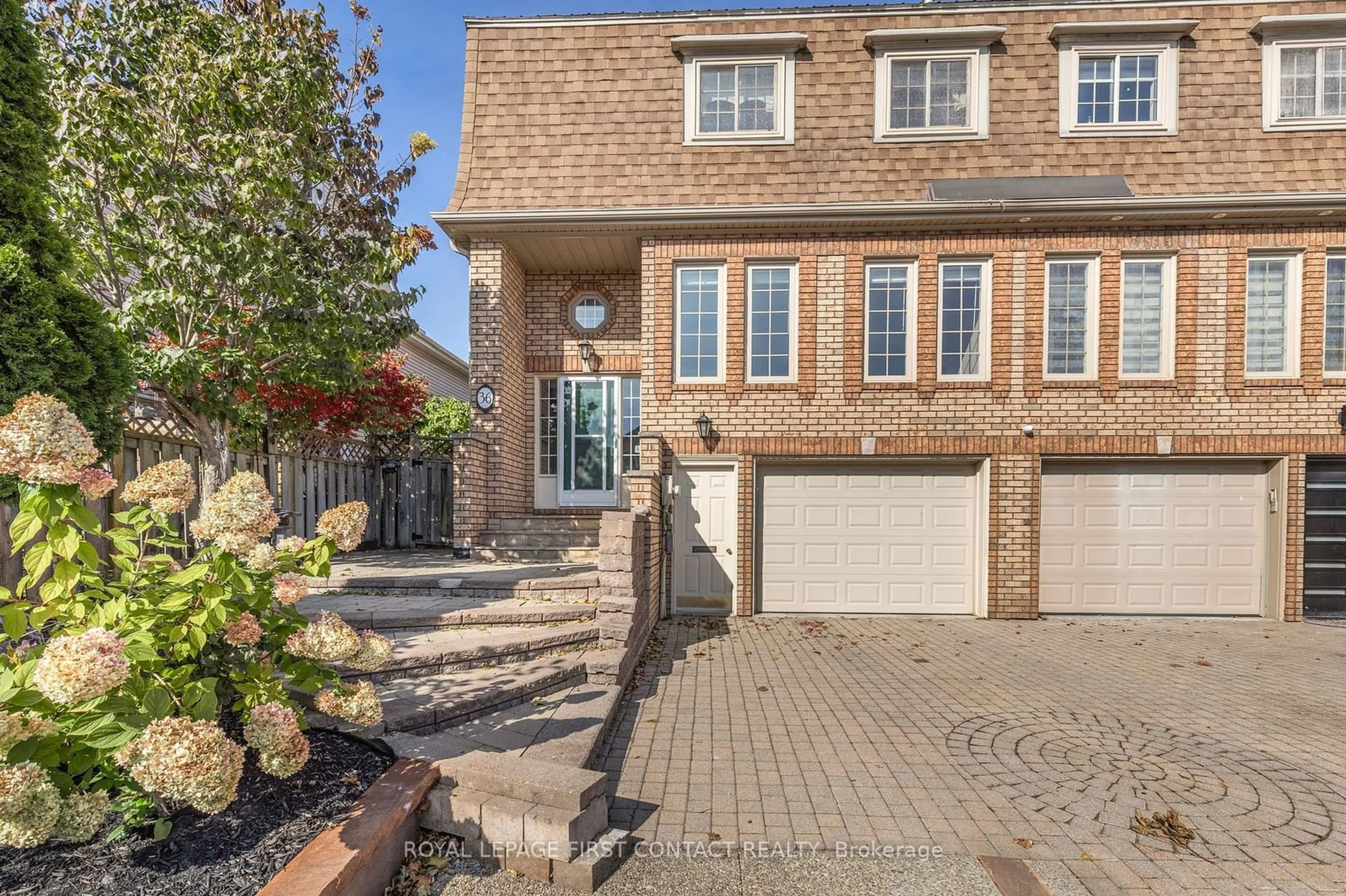 Home with brick exterior material, street for 36 Kempenfelt Dr, Barrie Ontario L4M 1B9