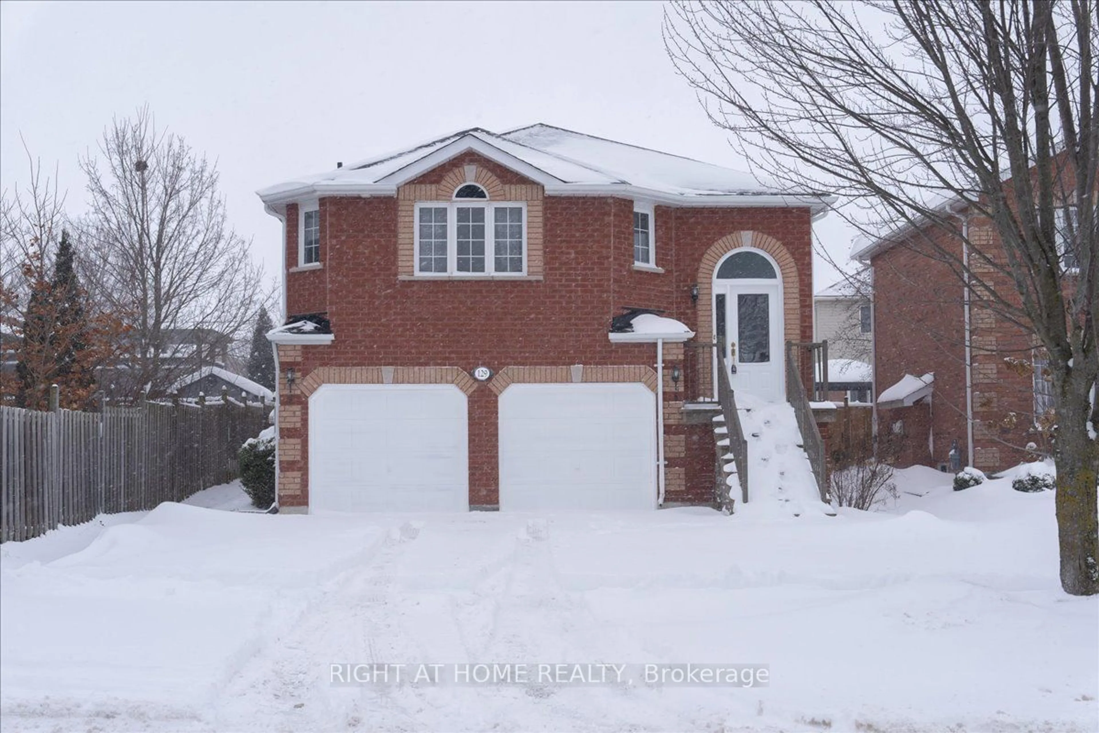 Home with brick exterior material, street for 129 Country Lane, Barrie Ontario L4N 0N2