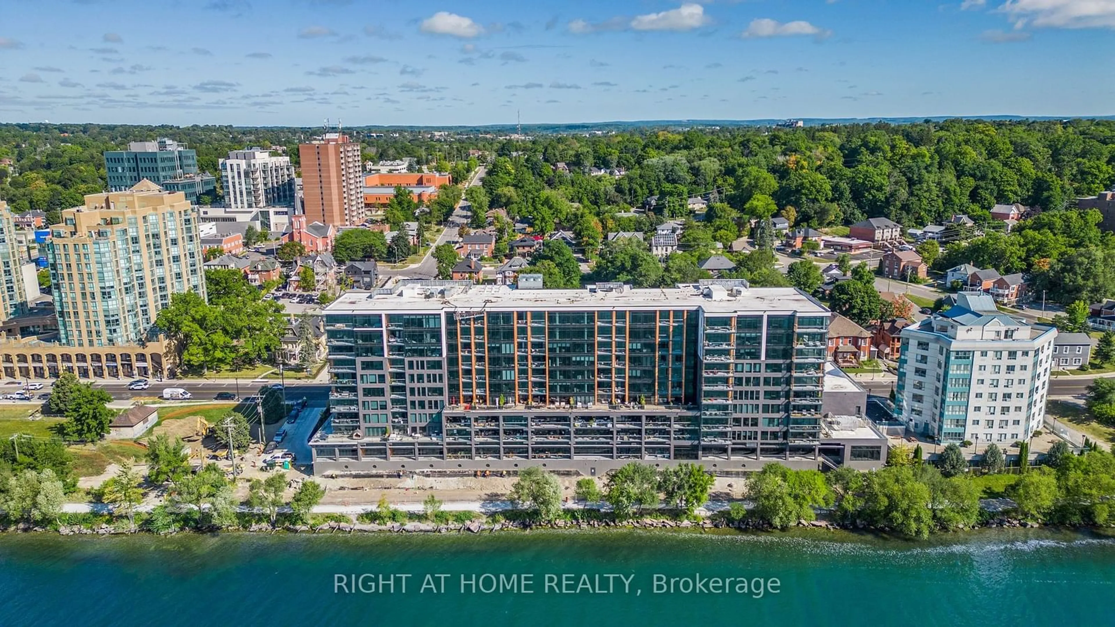 A pic from outside/outdoor area/front of a property/back of a property/a pic from drone, water/lake/river/ocean view for 185 Dunlop St #720, Barrie Ontario L4N 1B4