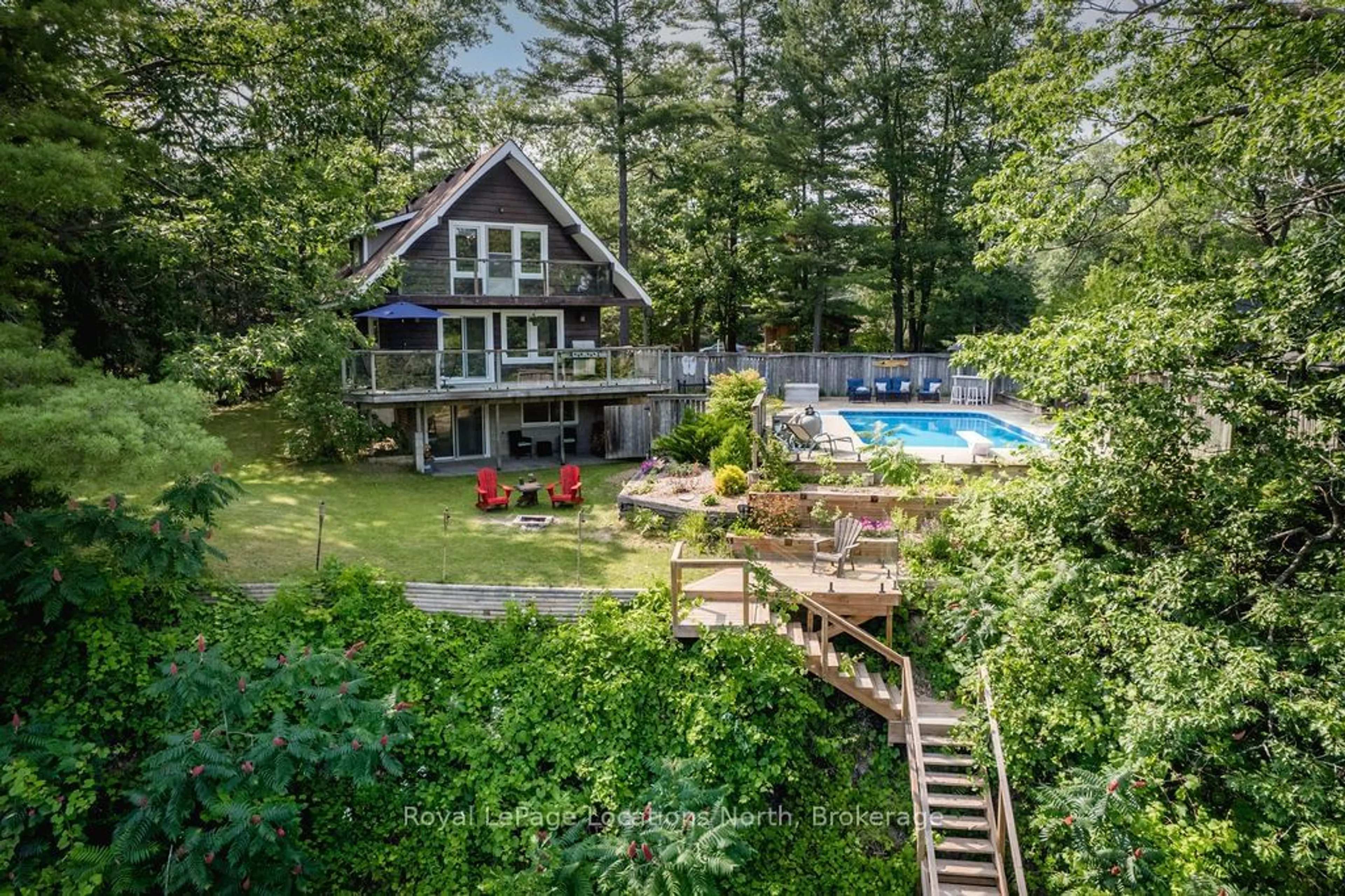 A pic from outside/outdoor area/front of a property/back of a property/a pic from drone, water/lake/river/ocean view for 157 WOODLAND Dr, Wasaga Beach Ontario L9Z 2V4