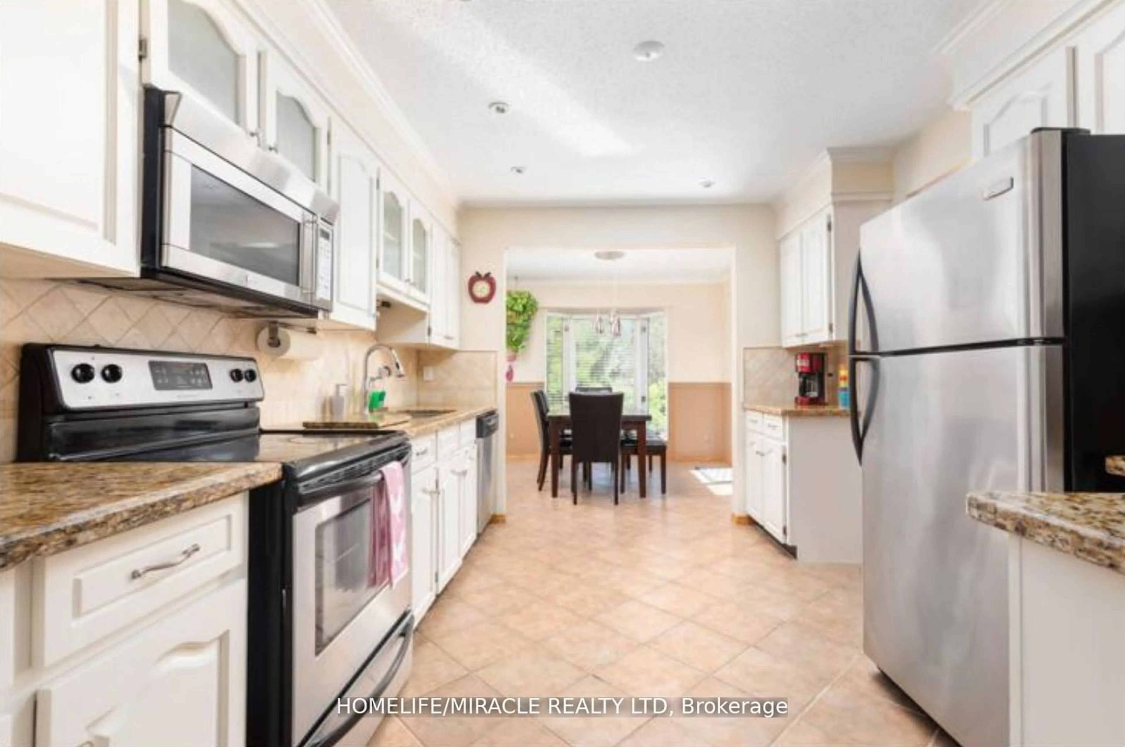 Open concept kitchen, ceramic/tile floor for 51 Beck Blvd, Penetanguishene Ontario L9M 1E2