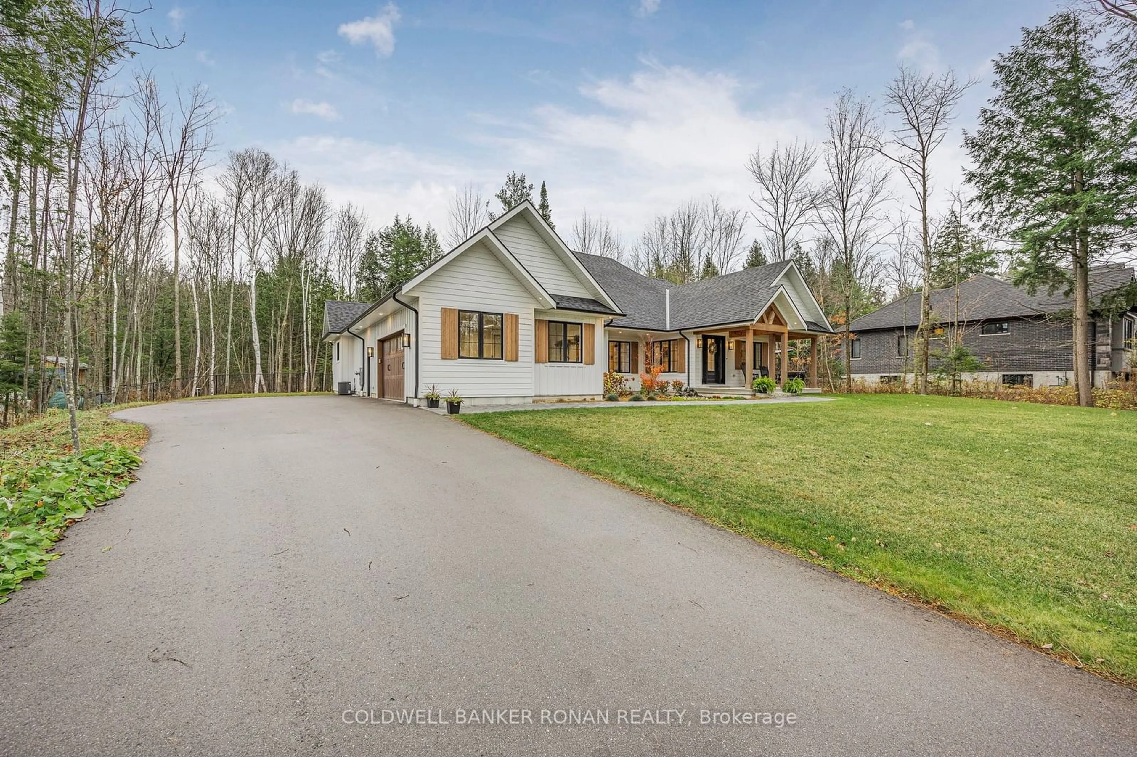 A pic from outside/outdoor area/front of a property/back of a property/a pic from drone, street for 56 Marni Lane, Springwater Ontario L0L 2K0