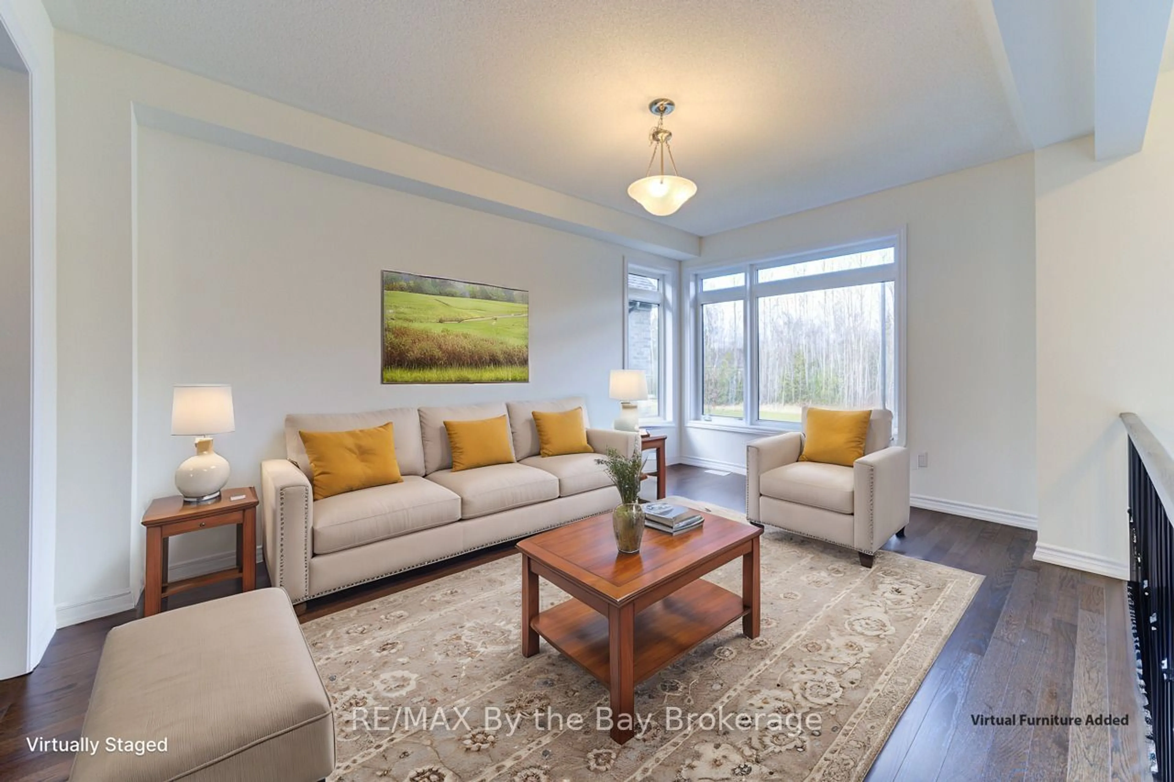 Living room with furniture, wood/laminate floor for 206 Mapleside Dr, Wasaga Beach Ontario L9Z 0L4