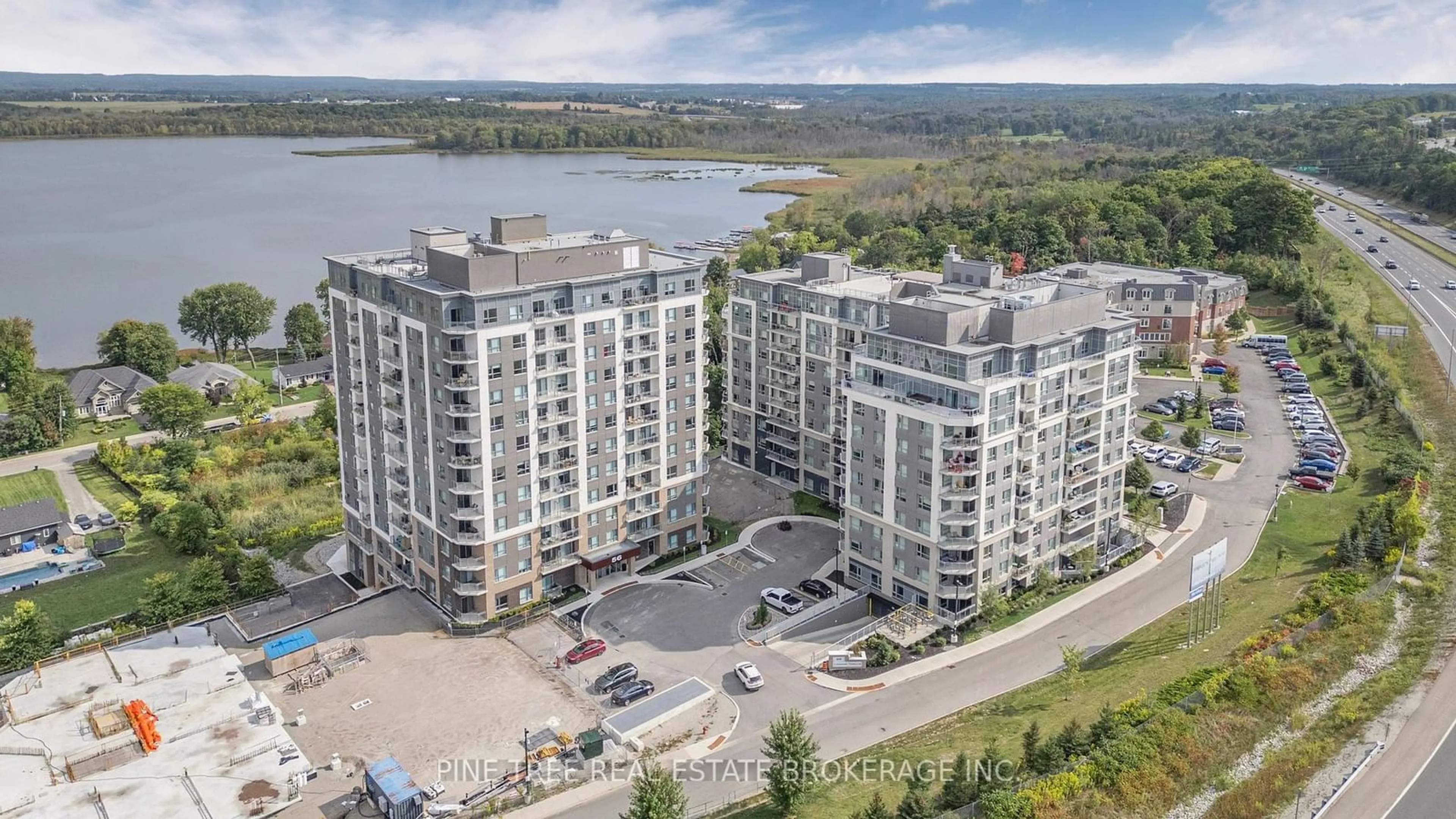 A pic from outside/outdoor area/front of a property/back of a property/a pic from drone, water/lake/river/ocean view for 58 Lakeside Terr #1105, Barrie Ontario L4N 9S2