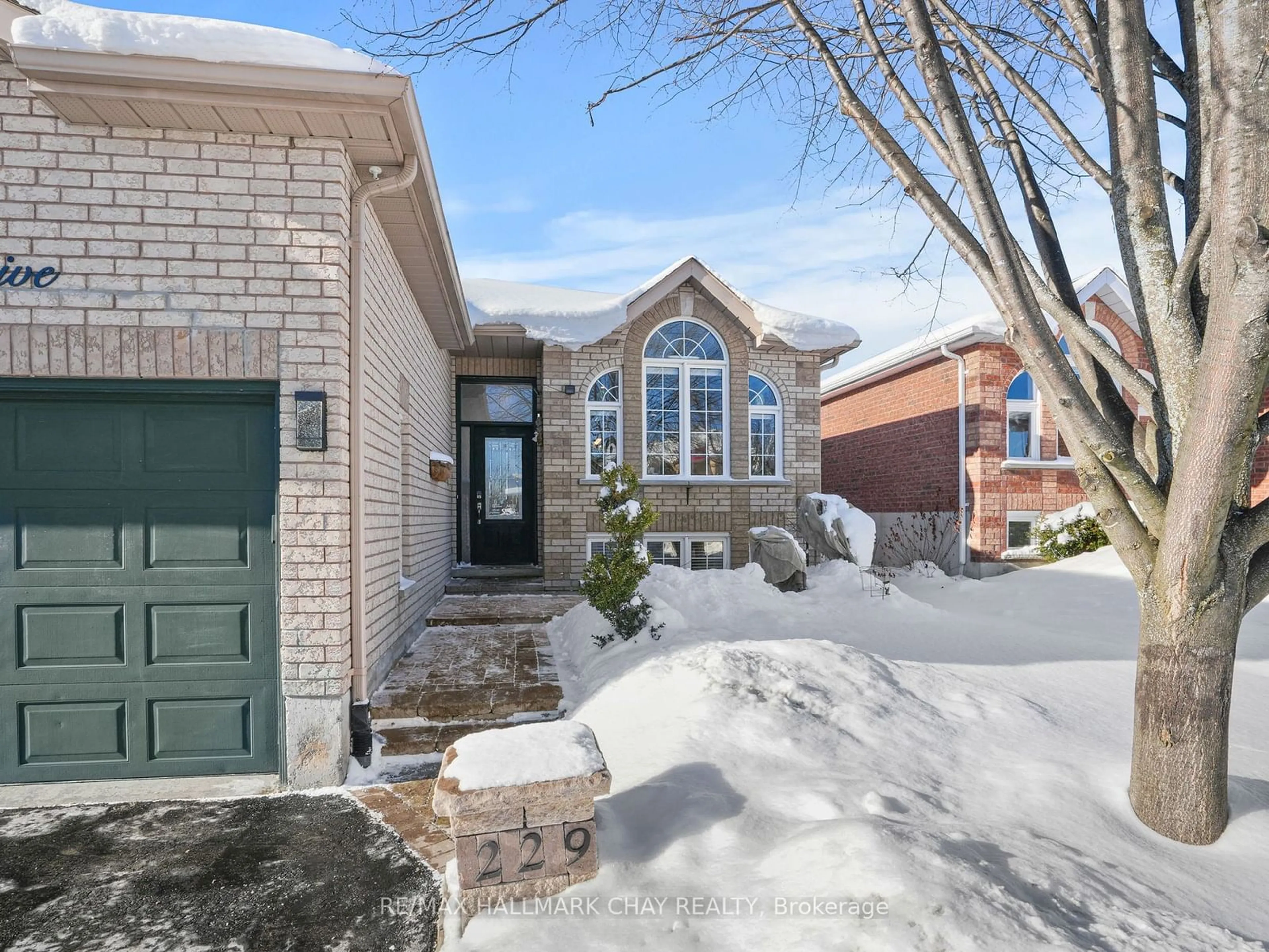 Home with brick exterior material, street for 229 Wessenger Dr, Barrie Ontario L4N 8R4