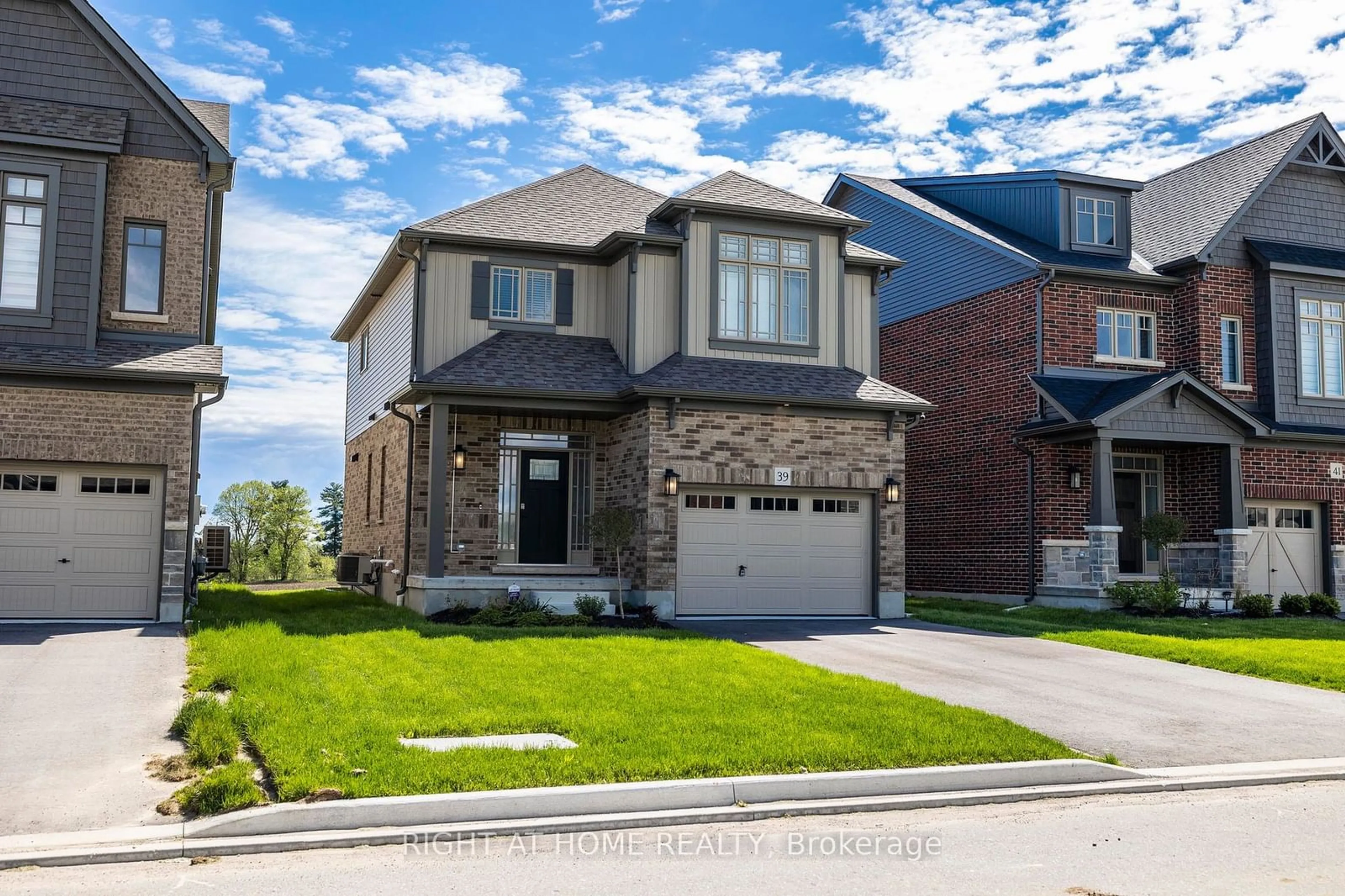 Home with brick exterior material, street for 39 Maidens Cres, Collingwood Ontario L9Y 0E2