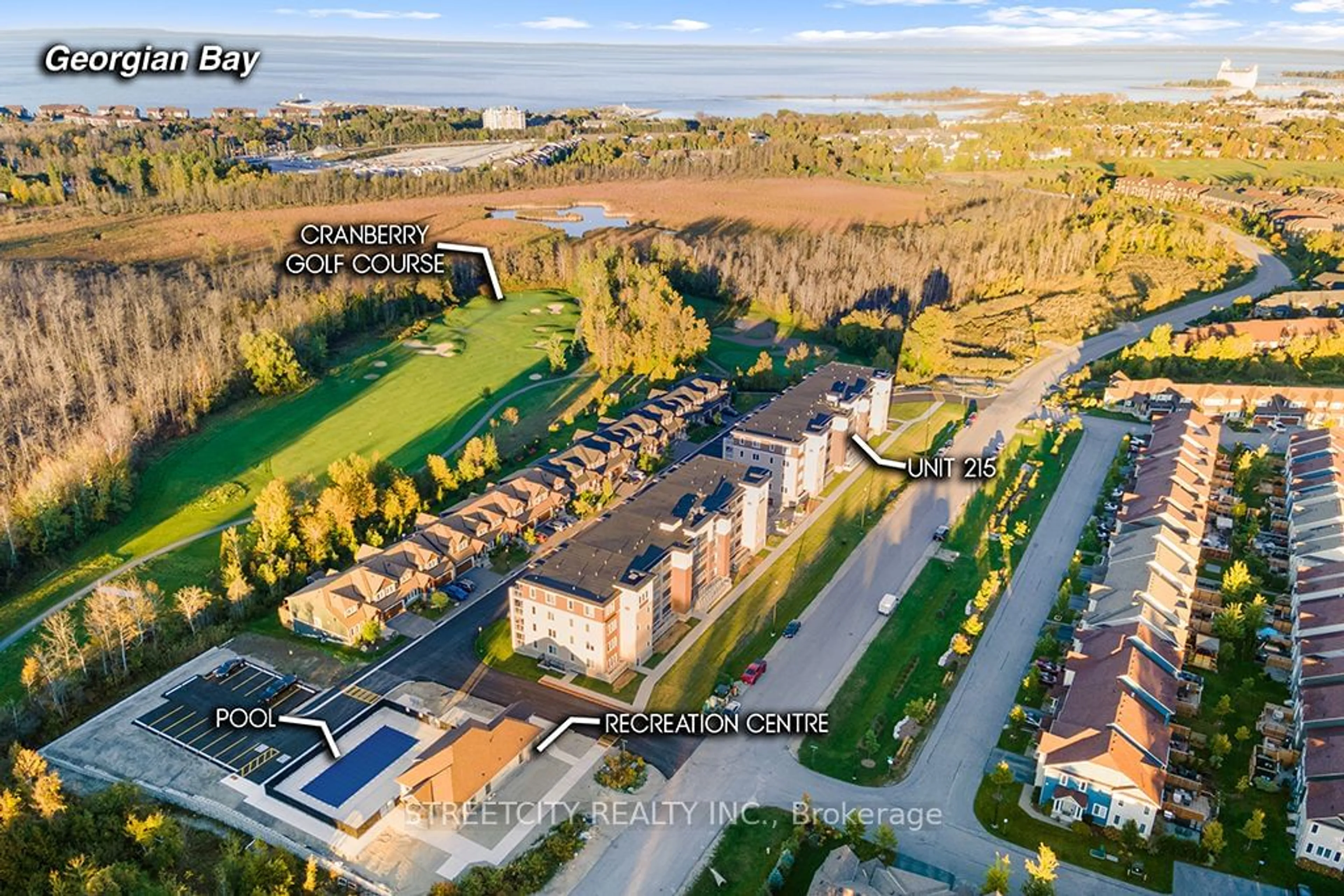 A pic from outside/outdoor area/front of a property/back of a property/a pic from drone, unknown for 5 Spooner Cres #215, Collingwood Ontario L9Y 1T3