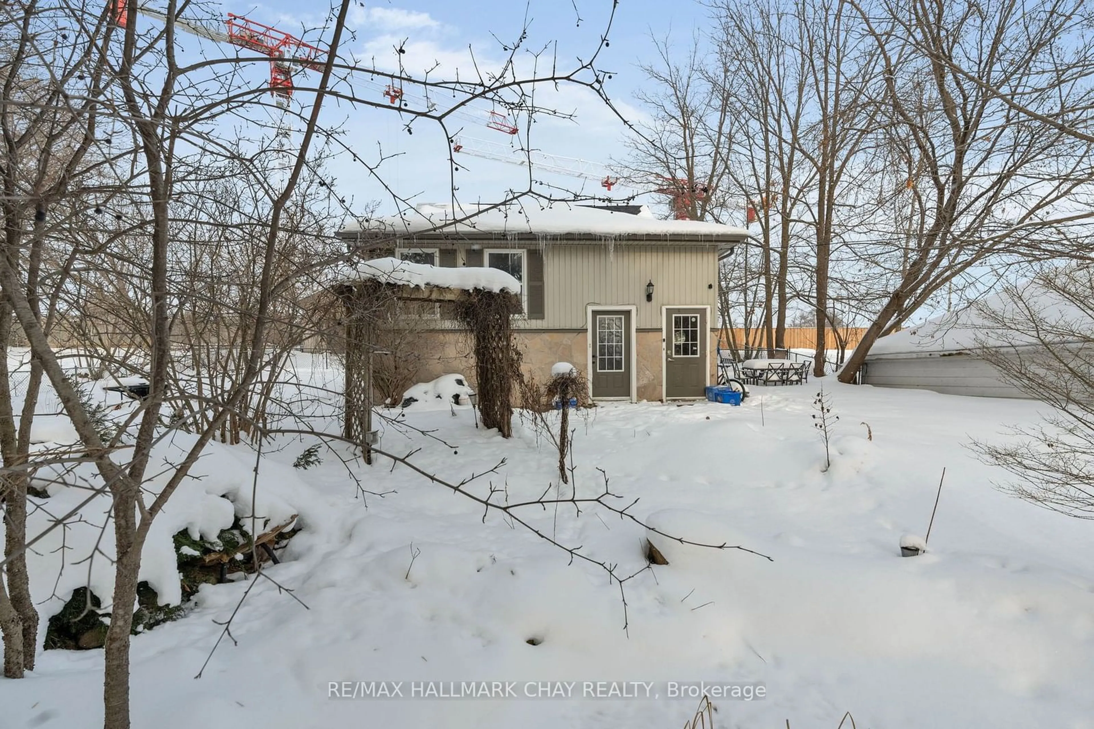 A pic from outside/outdoor area/front of a property/back of a property/a pic from drone, street for 32 Grove St #1, 2, 3, Barrie Ontario L4N 1M7