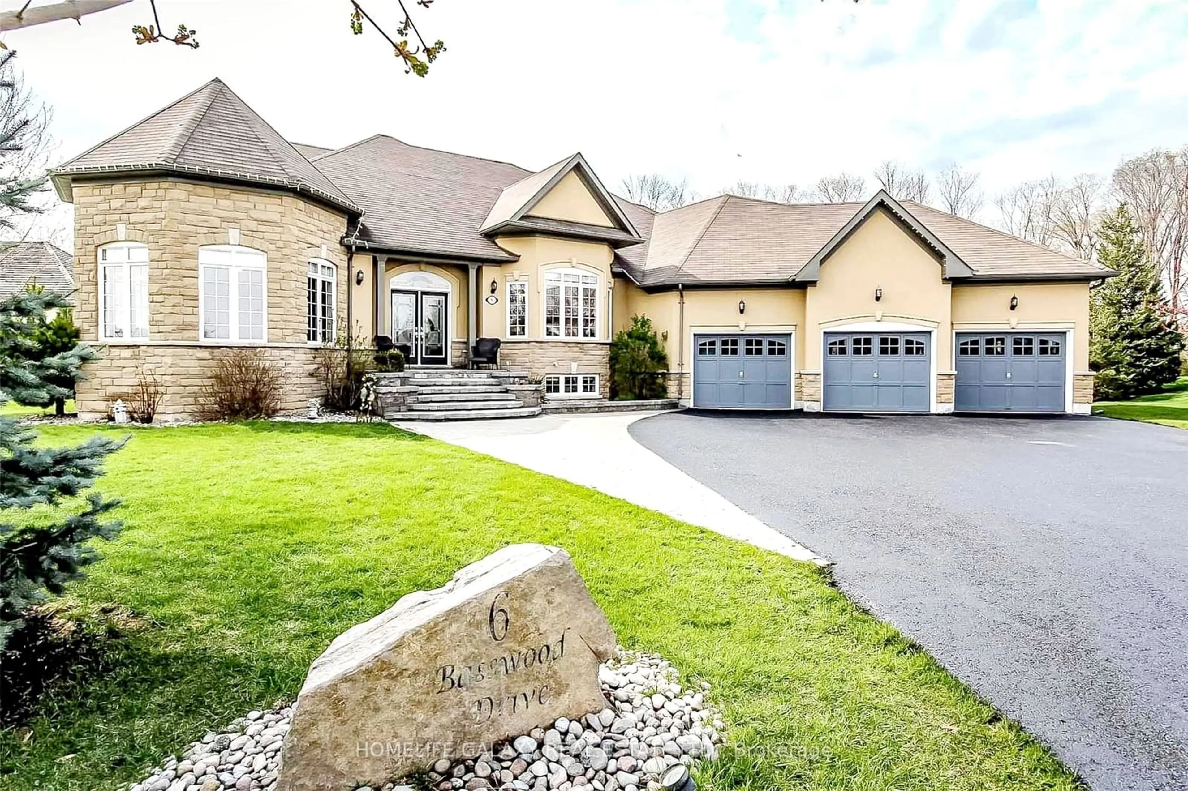 Home with brick exterior material, street for 6 Basswood Dr, Wasaga Beach Ontario L9Z 0A9