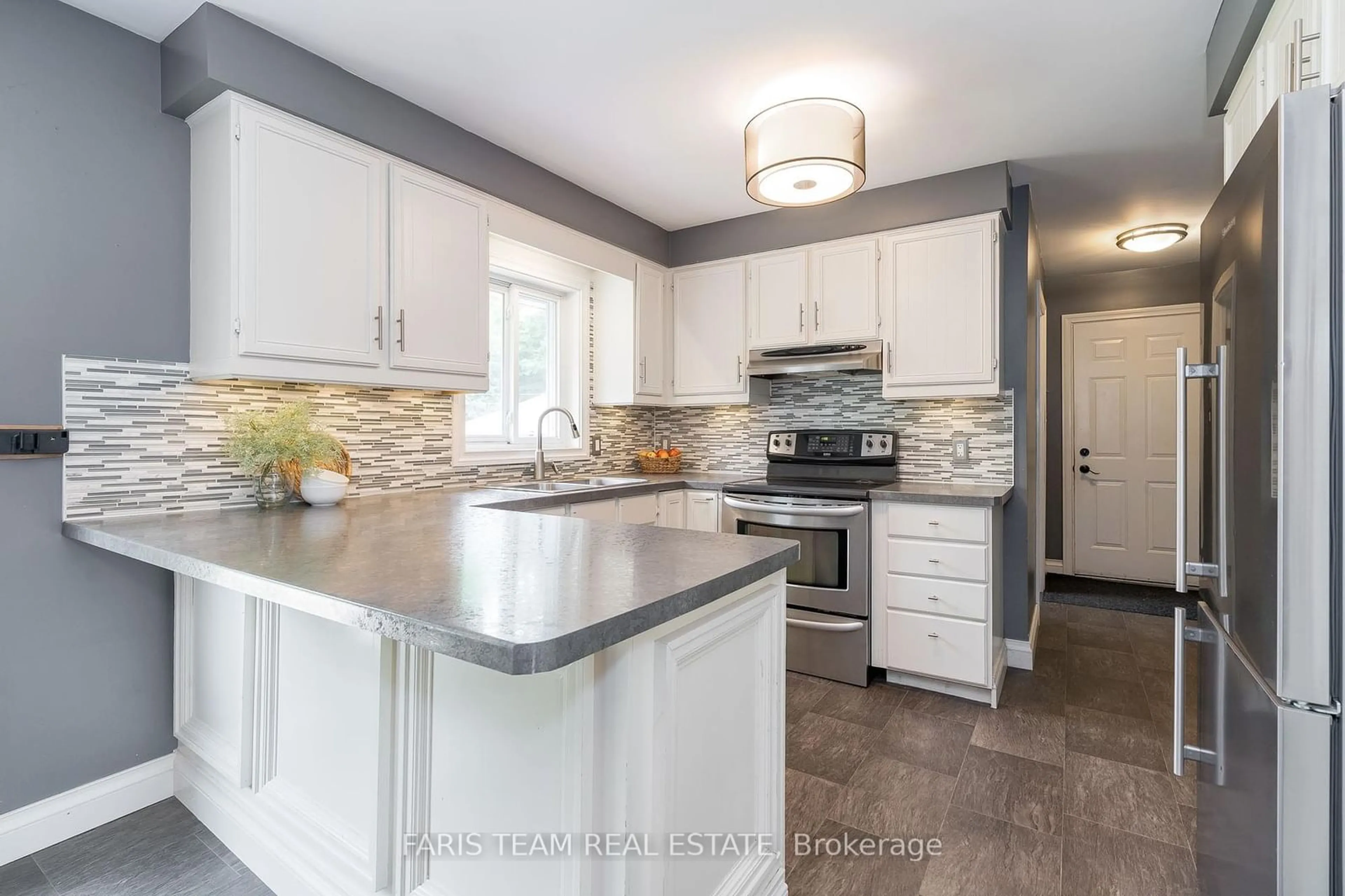 Open concept kitchen, ceramic/tile floor for 220 Moonstone Rd, Oro-Medonte Ontario L0K 1N0