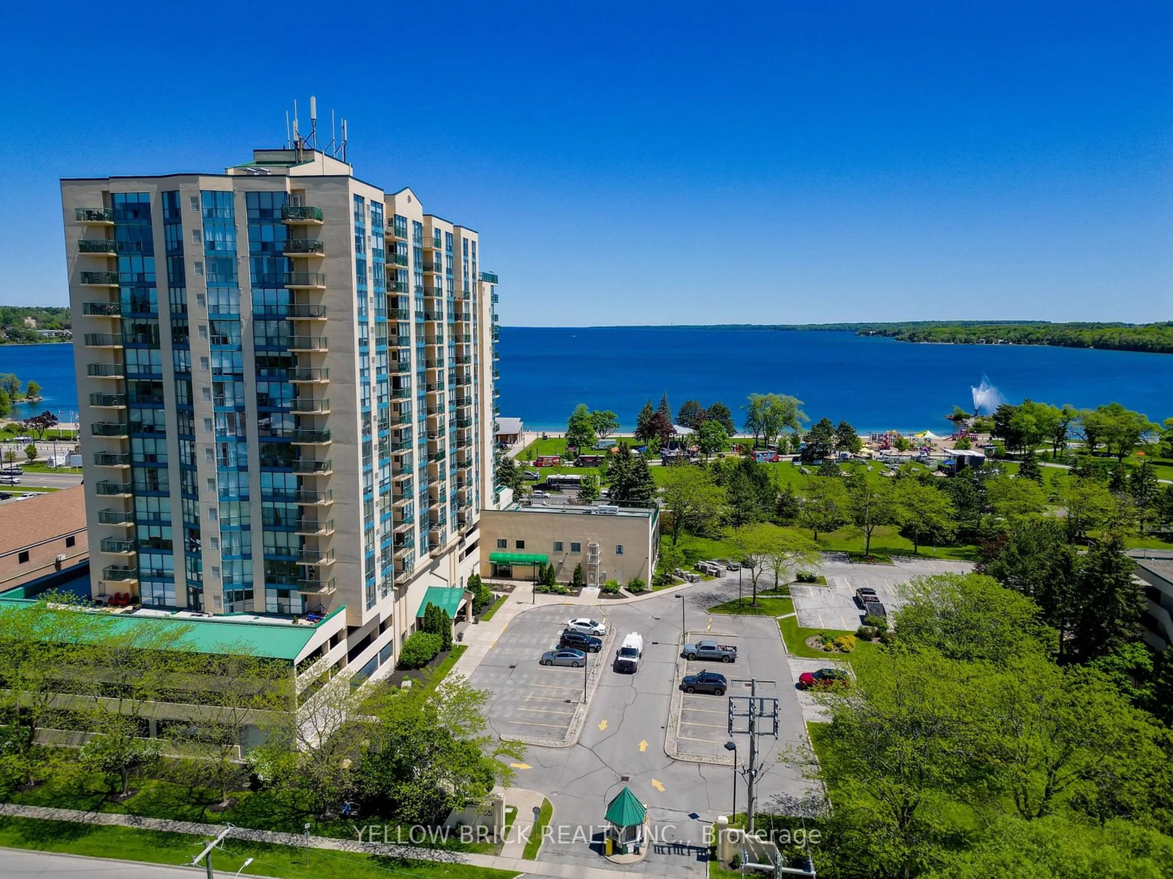 A pic from outside/outdoor area/front of a property/back of a property/a pic from drone, water/lake/river/ocean view for 65 Ellen St #208, Barrie Ontario L4N 3A5