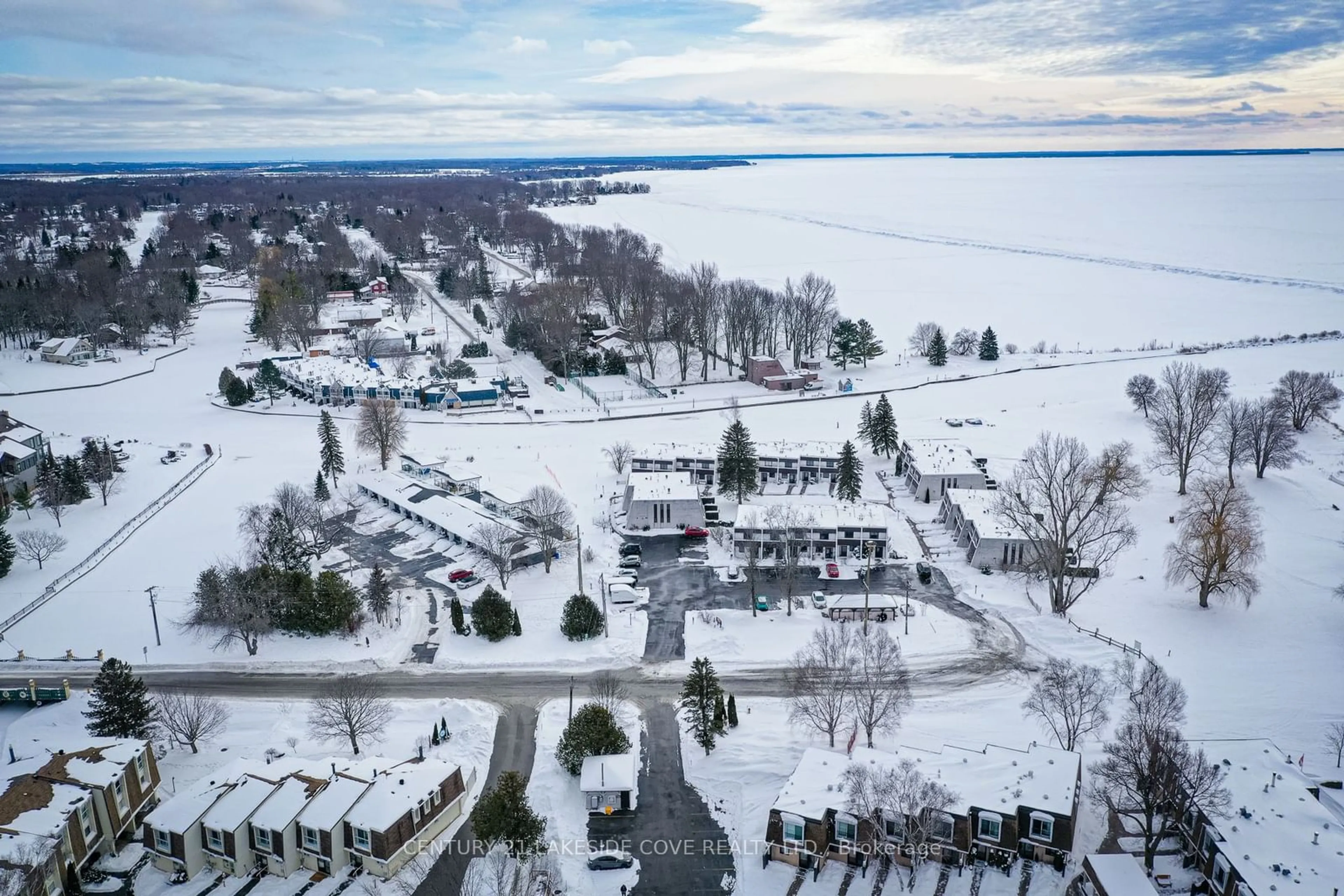 A pic from outside/outdoor area/front of a property/back of a property/a pic from drone, water/lake/river/ocean view for 1 Paradise Blvd #Unit 27, Ramara Ontario L0K 1B0