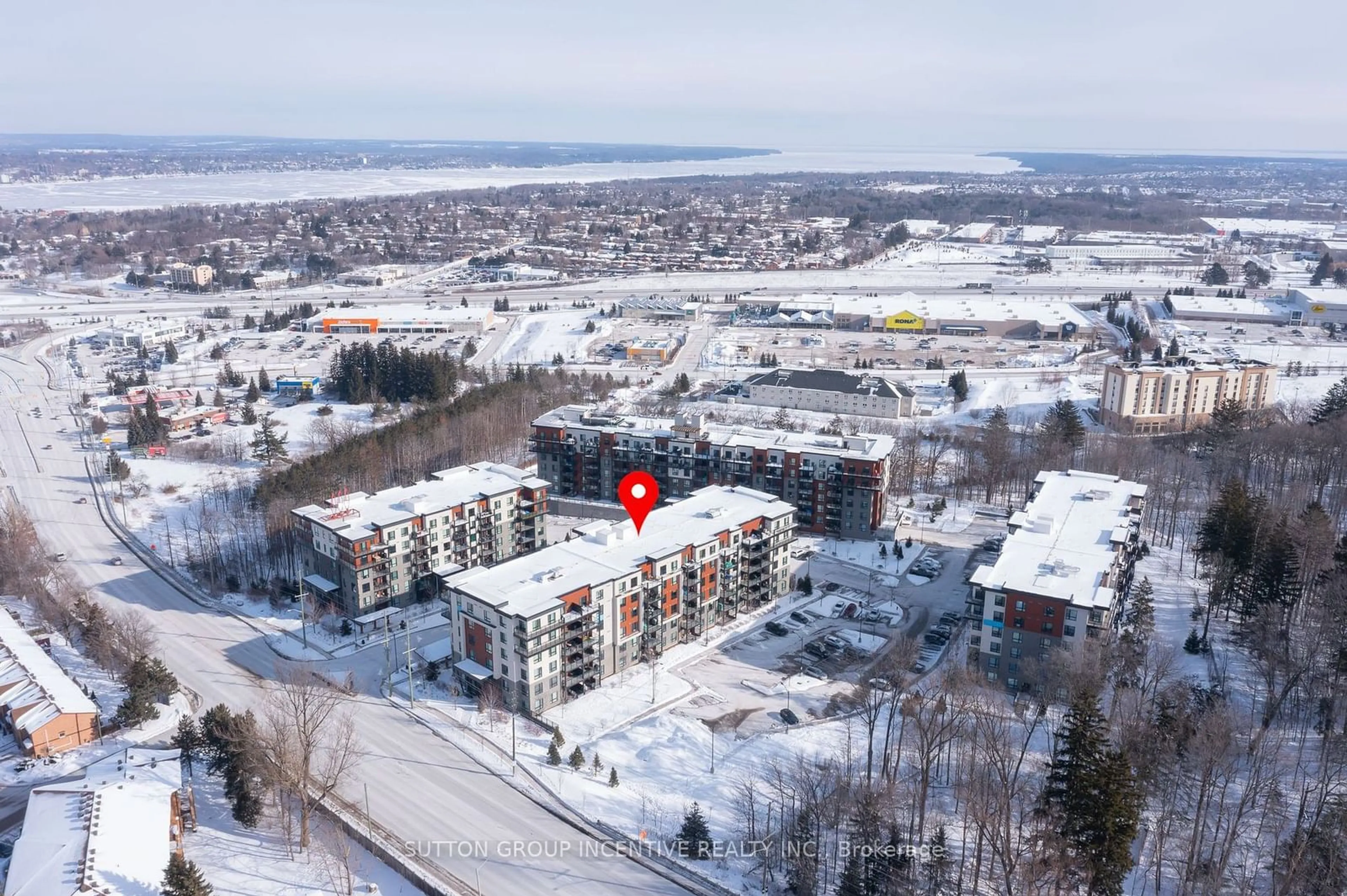 A pic from outside/outdoor area/front of a property/back of a property/a pic from drone, unknown for 306 Essa Rd #208, Barrie Ontario L9J 0H5