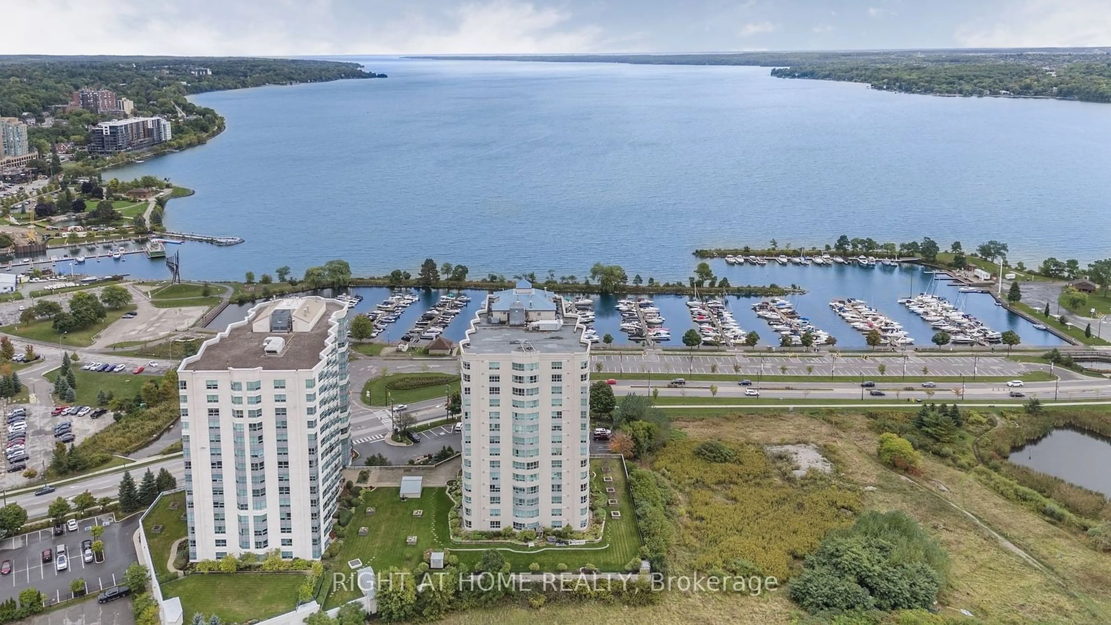 A pic from outside/outdoor area/front of a property/back of a property/a pic from drone, water/lake/river/ocean view for 2 Toronto St #401, Barrie Ontario L4N 9R2