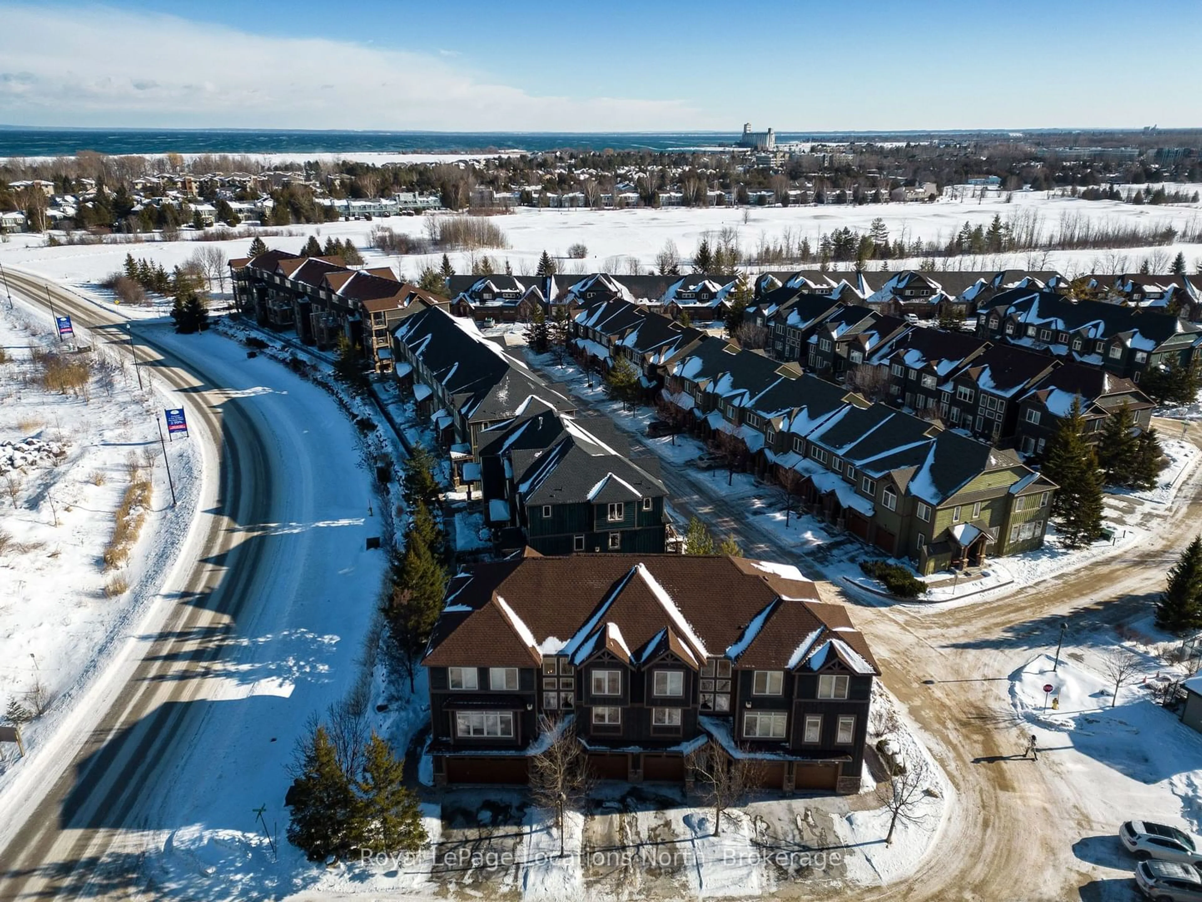 A pic from outside/outdoor area/front of a property/back of a property/a pic from drone, water/lake/river/ocean view for 64 JOSEPH Tr, Collingwood Ontario L9Y 0J3