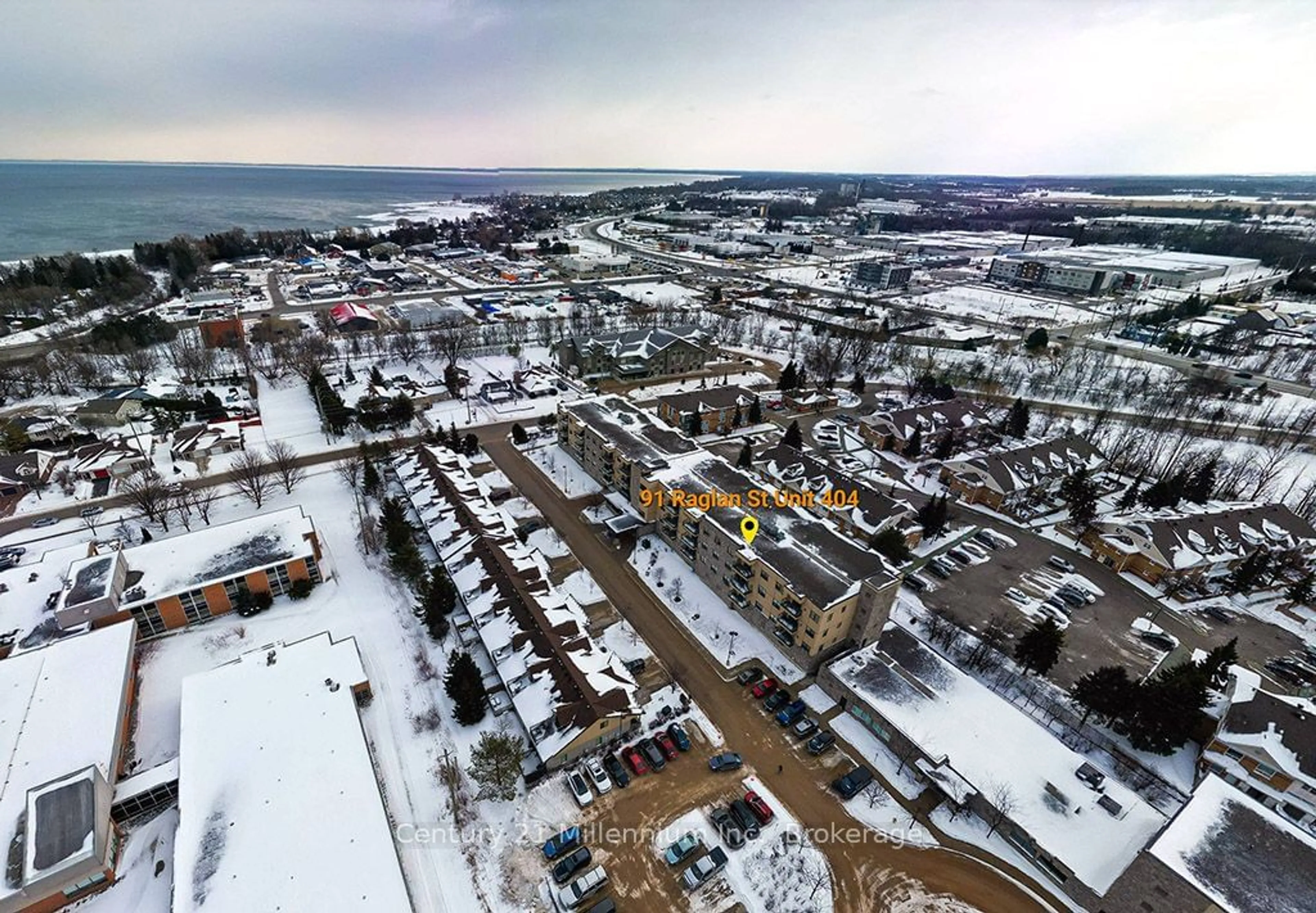 A pic from outside/outdoor area/front of a property/back of a property/a pic from drone, street for 91 Raglan St #404, Collingwood Ontario L9Y 0B2