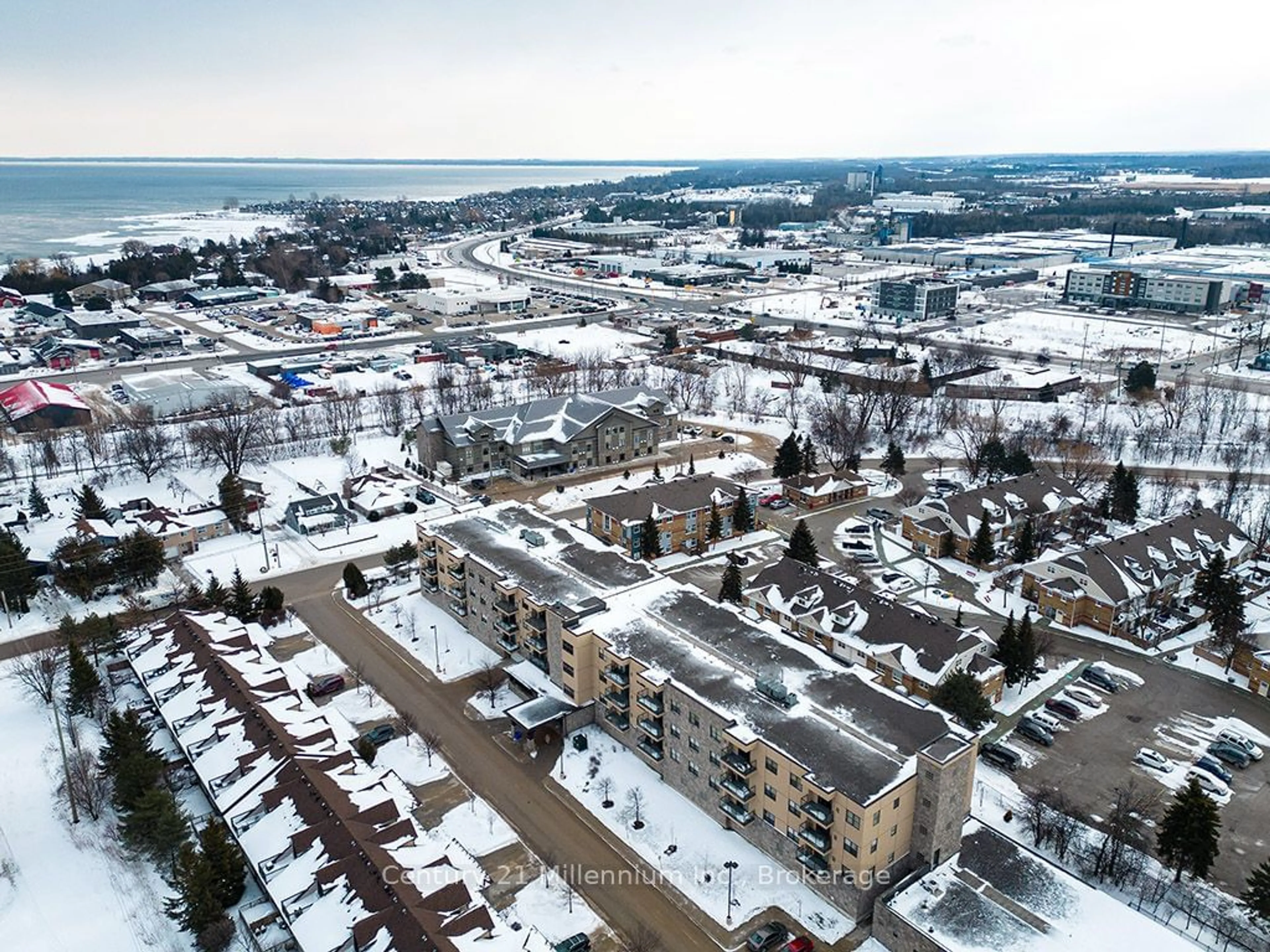 A pic from outside/outdoor area/front of a property/back of a property/a pic from drone, street for 91 Raglan St #404, Collingwood Ontario L9Y 0B2