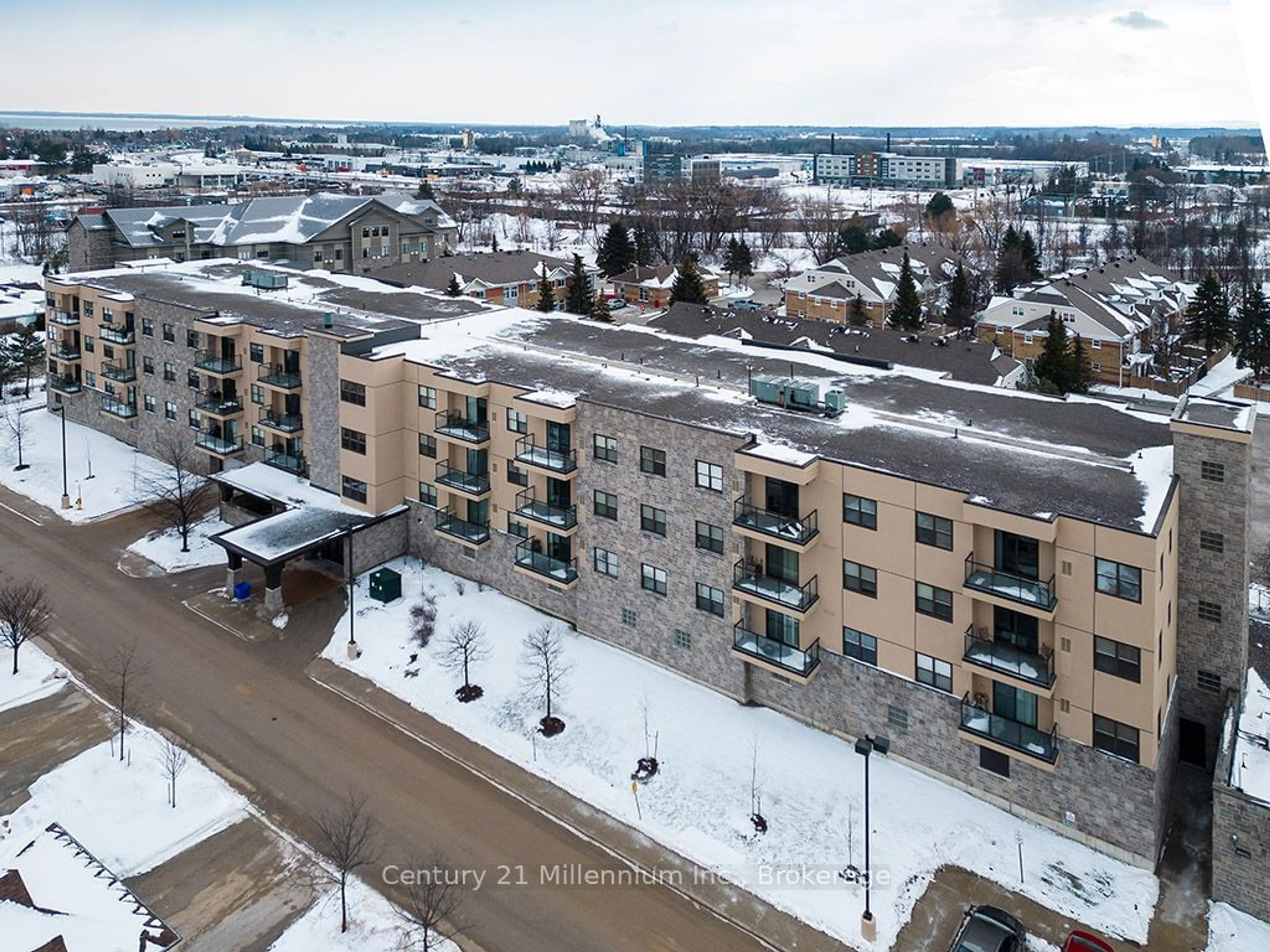 A pic from outside/outdoor area/front of a property/back of a property/a pic from drone, city buildings view from balcony for 91 Raglan St #404, Collingwood Ontario L9Y 0B2