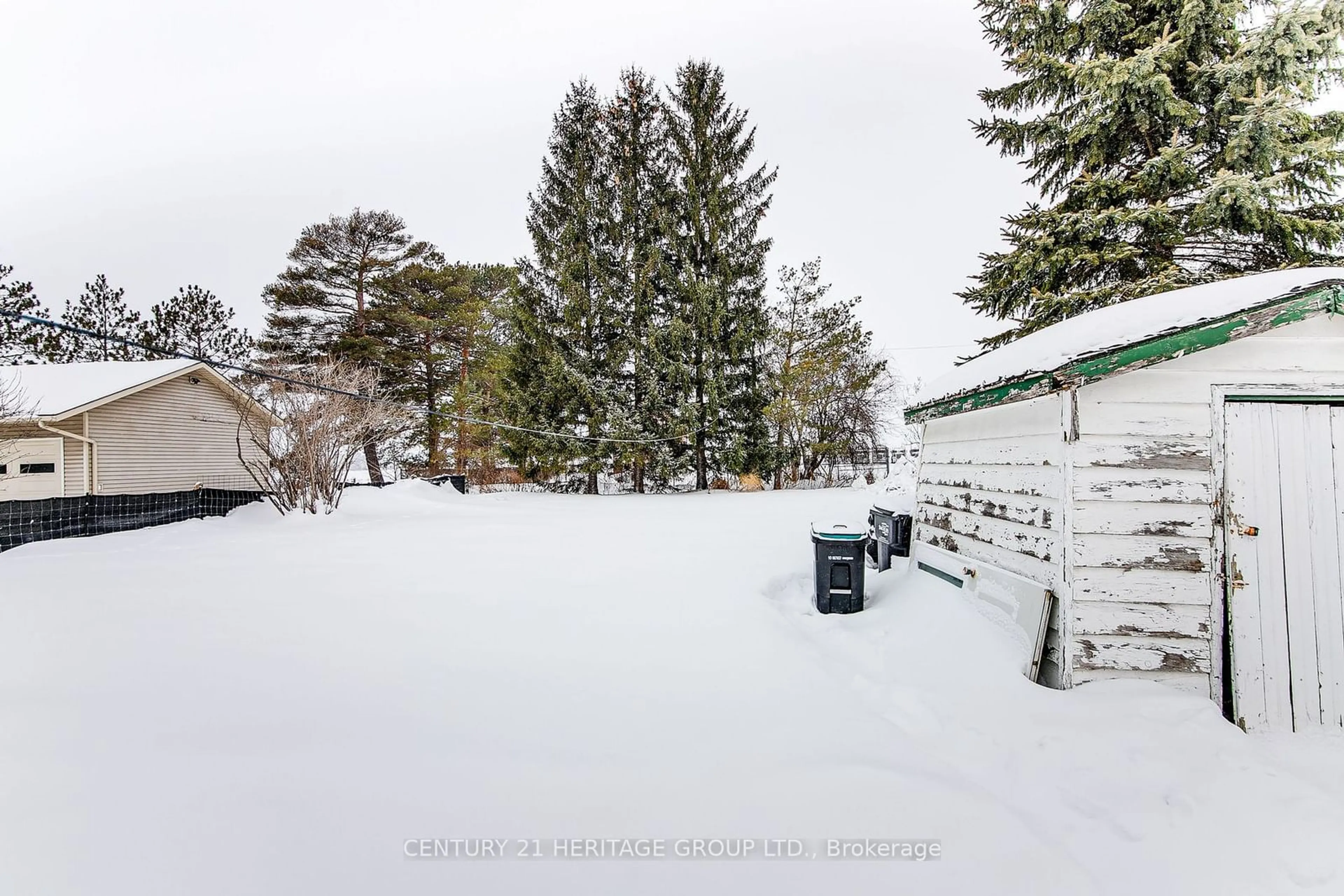 A pic from outside/outdoor area/front of a property/back of a property/a pic from drone, street for 144 Queen St, Springwater Ontario L0L 1P0