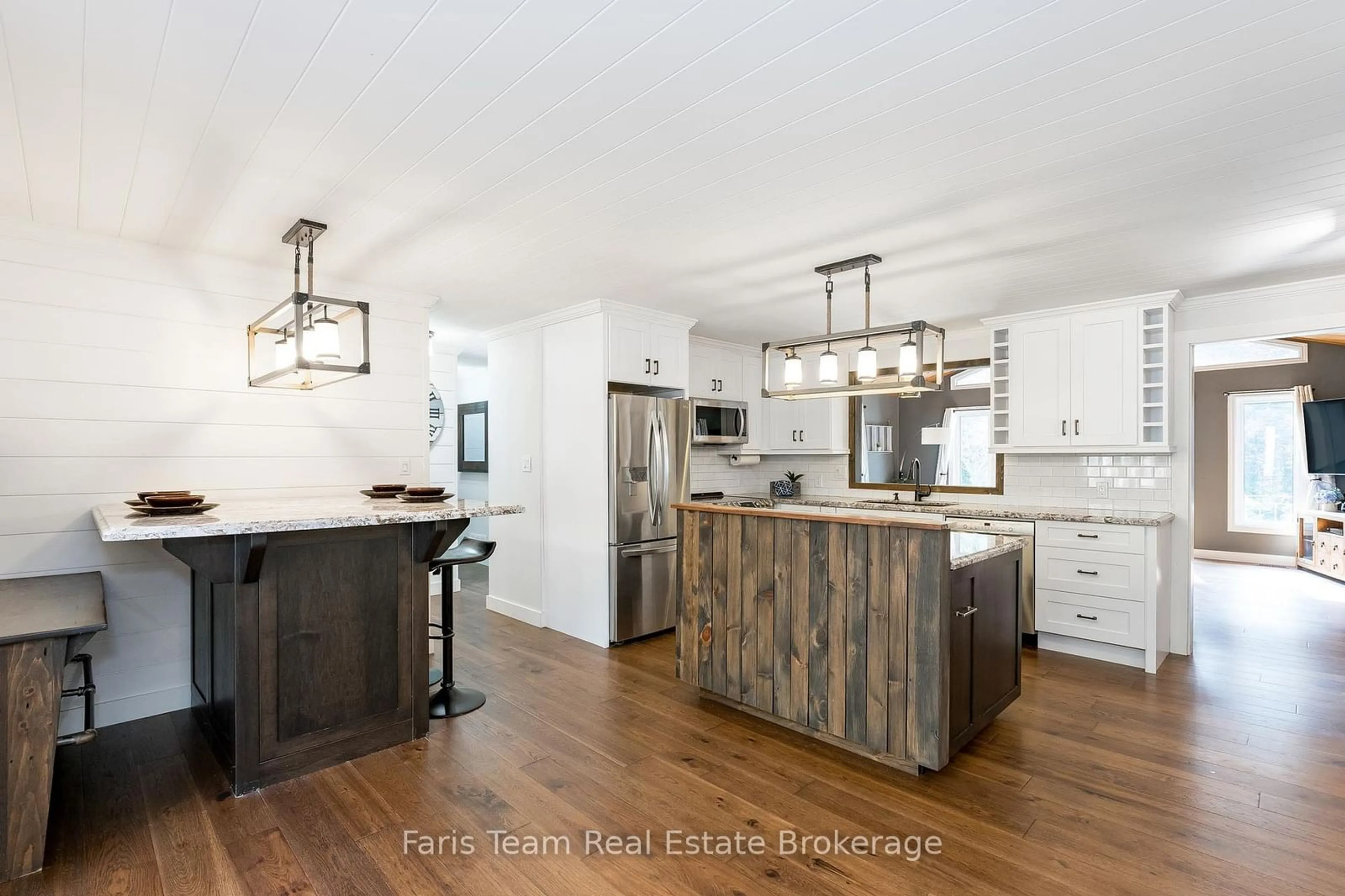 Open concept kitchen, wood/laminate floor for 8 Concession 13 Rd, Tiny Ontario L0L 2J0