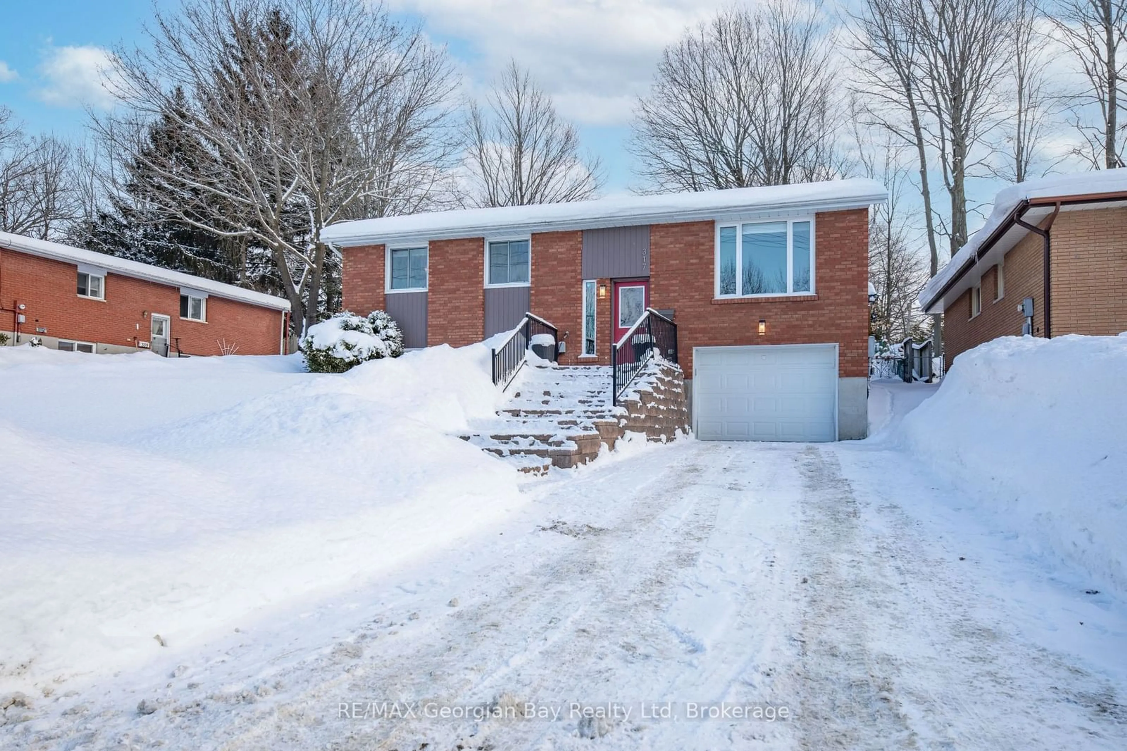 Home with brick exterior material, street for 317 Hanly St, Midland Ontario L4R 2N8