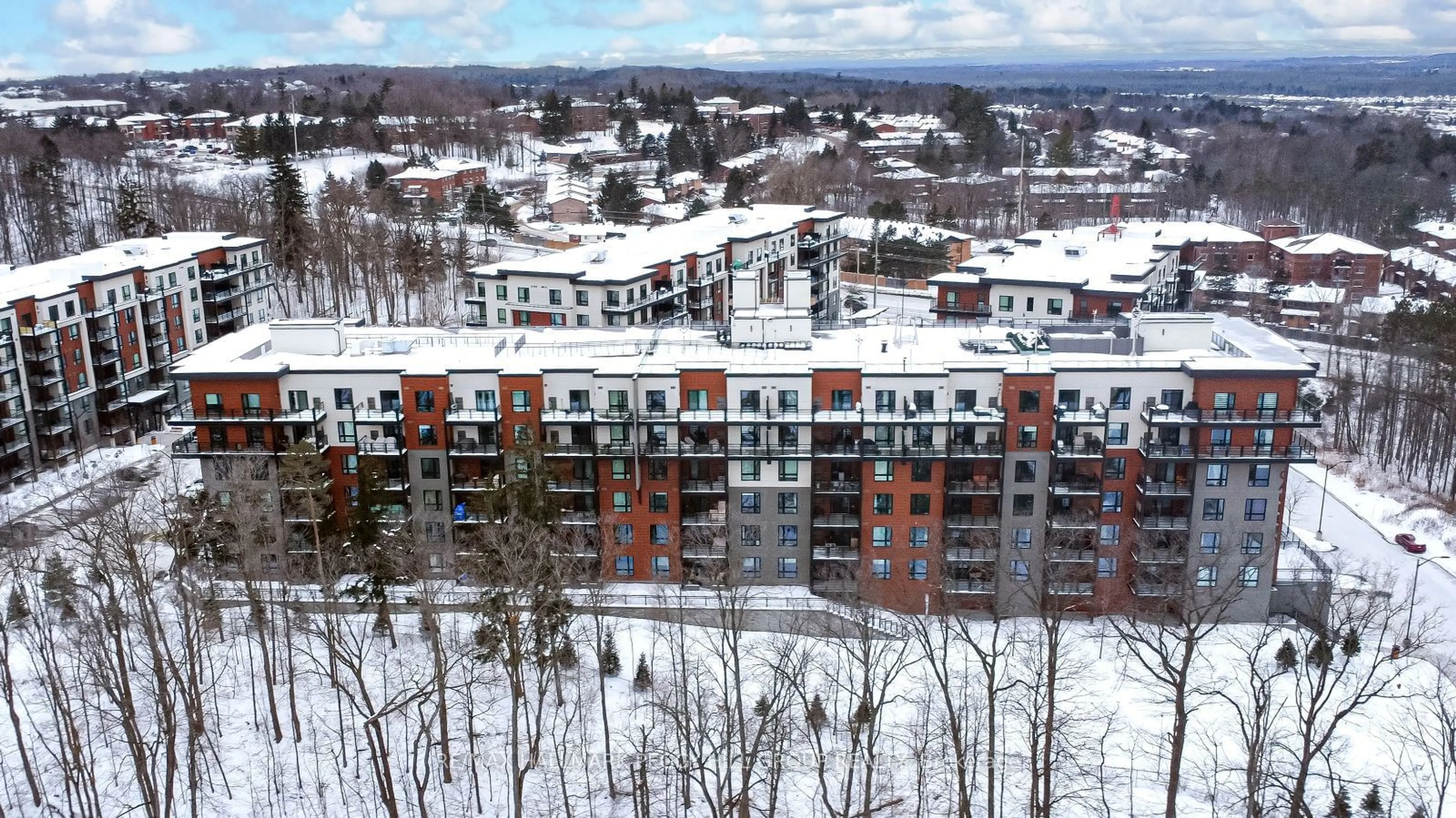 A pic from outside/outdoor area/front of a property/back of a property/a pic from drone, city buildings view from balcony for 302 Essa Rd #309, Barrie Ontario L9J 0H3